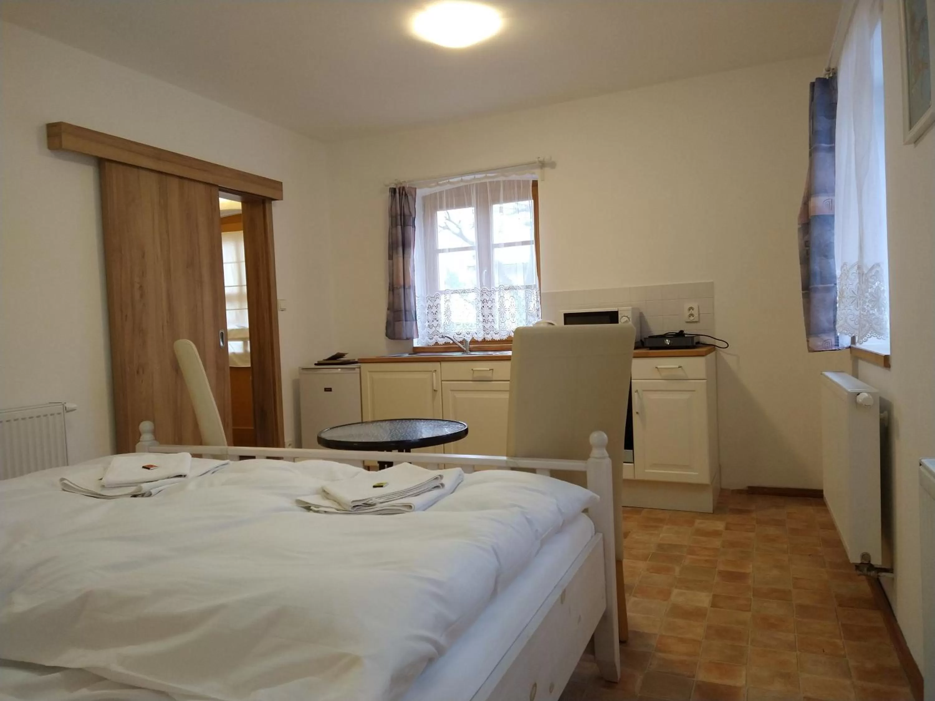 Coffee/tea facilities, Bed in Apartmány Malý mnich