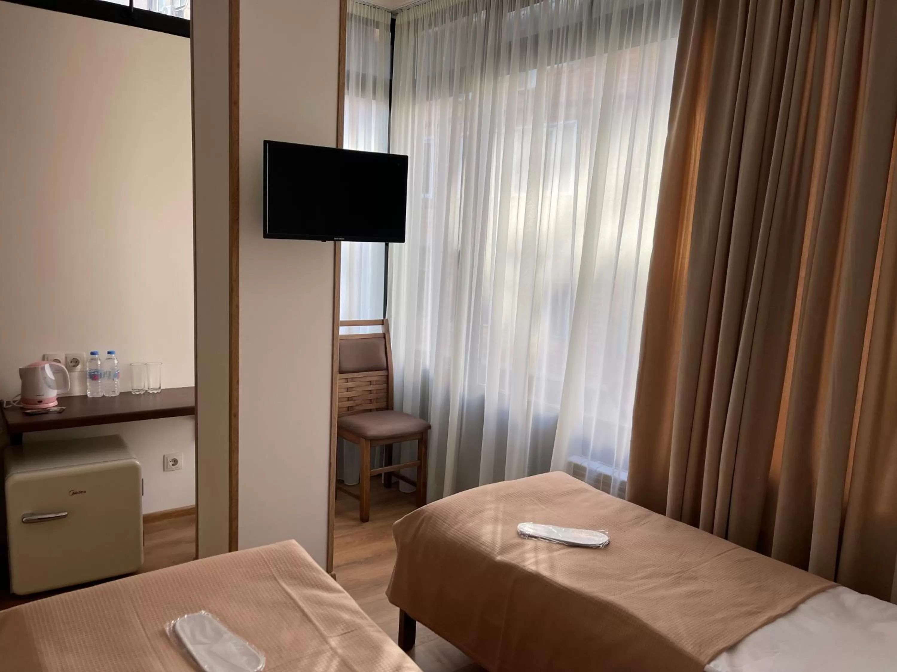 TV/Entertainment Center in ART family hotel