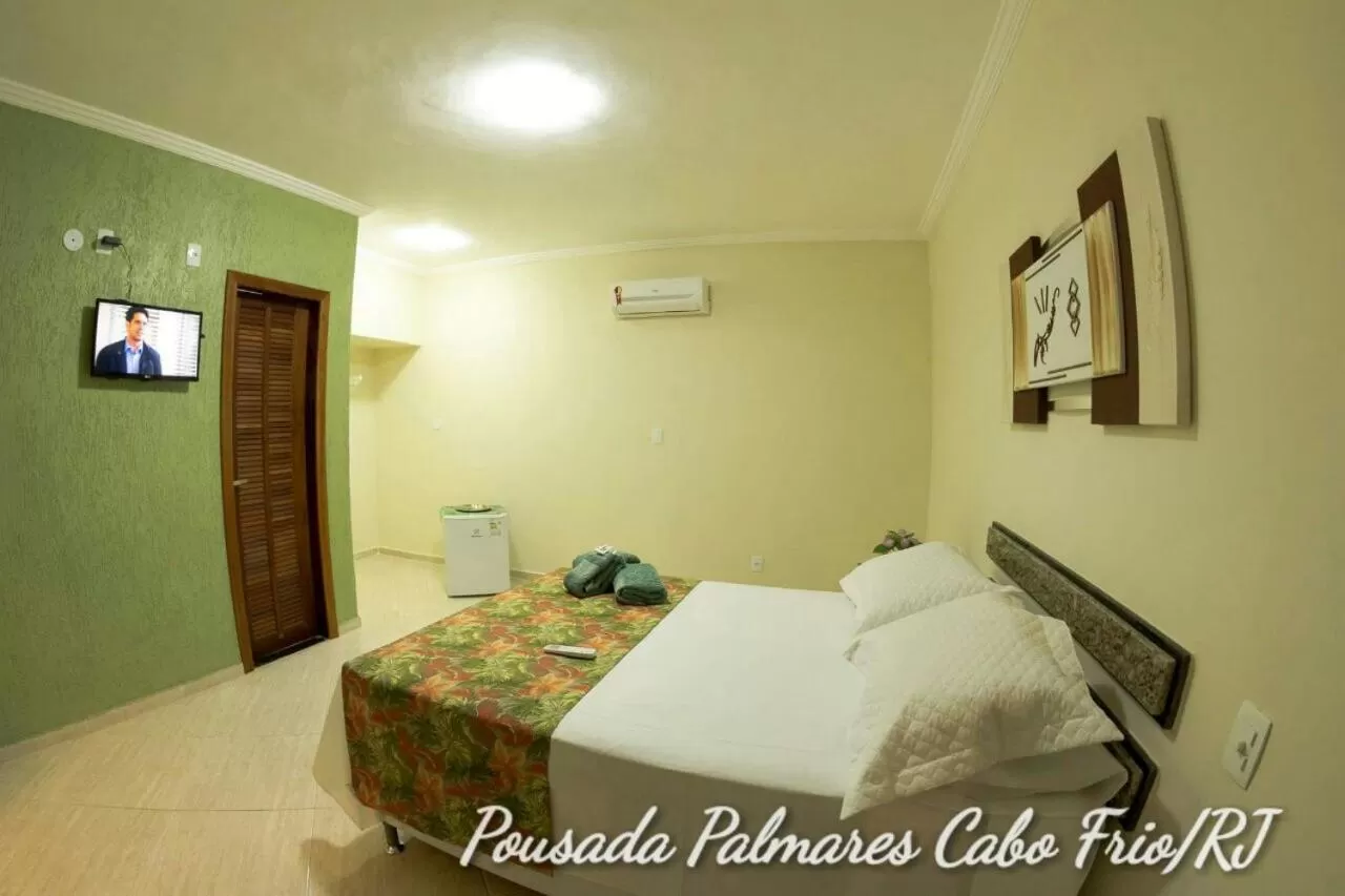 Bed in Pousada Palmares