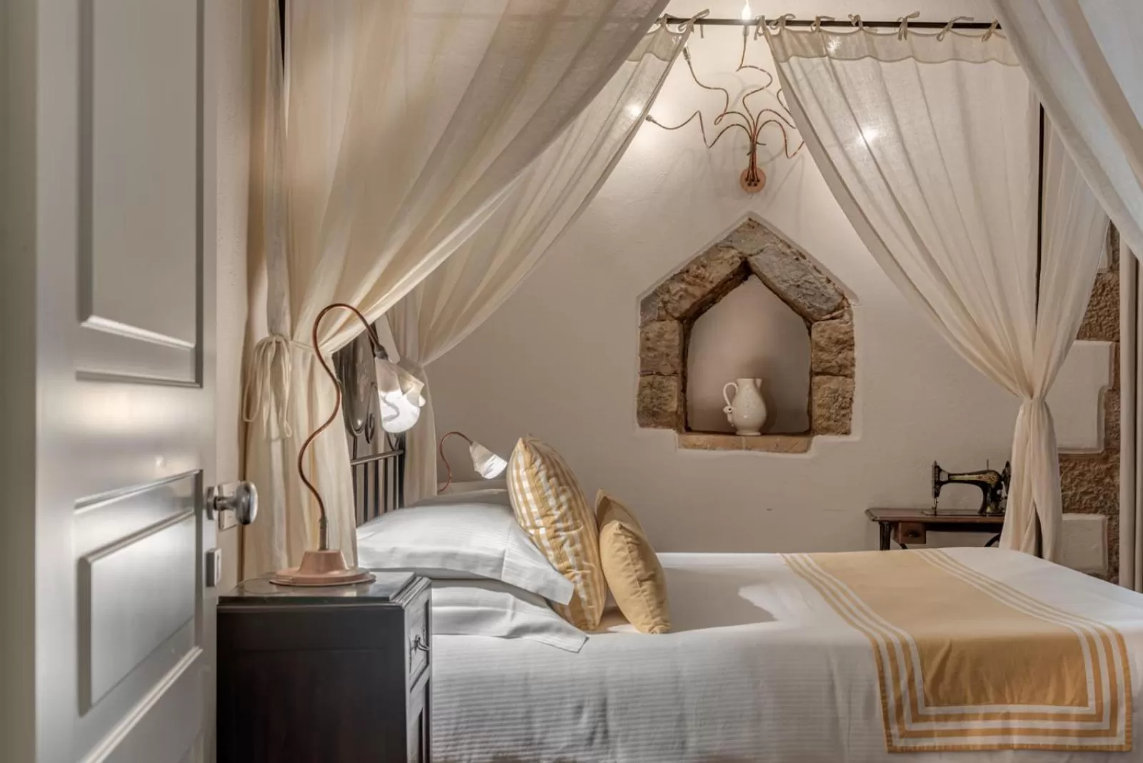 Photo of the whole room, Bed in PALAZZO DEL CAPITANO Wellness & Relais - Luxury Borgo Capitano Collection