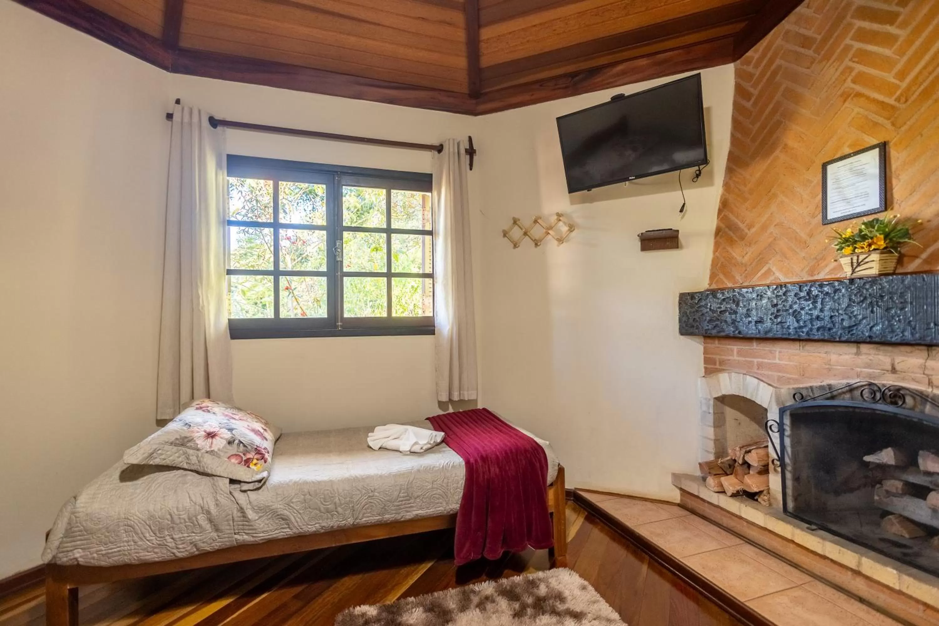 Bed in Chalés 3 Pinheiros