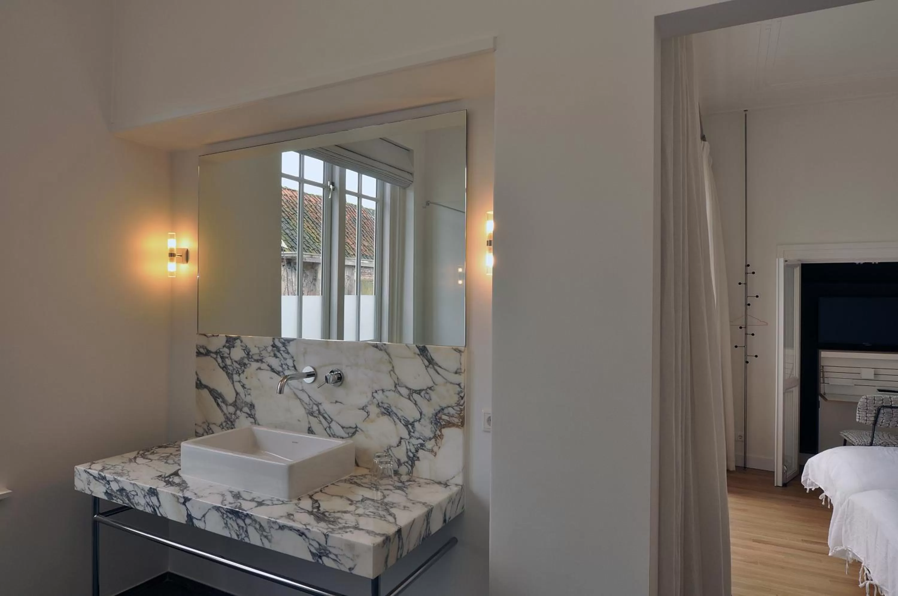 Bed in Boetiek Hotel Kampen