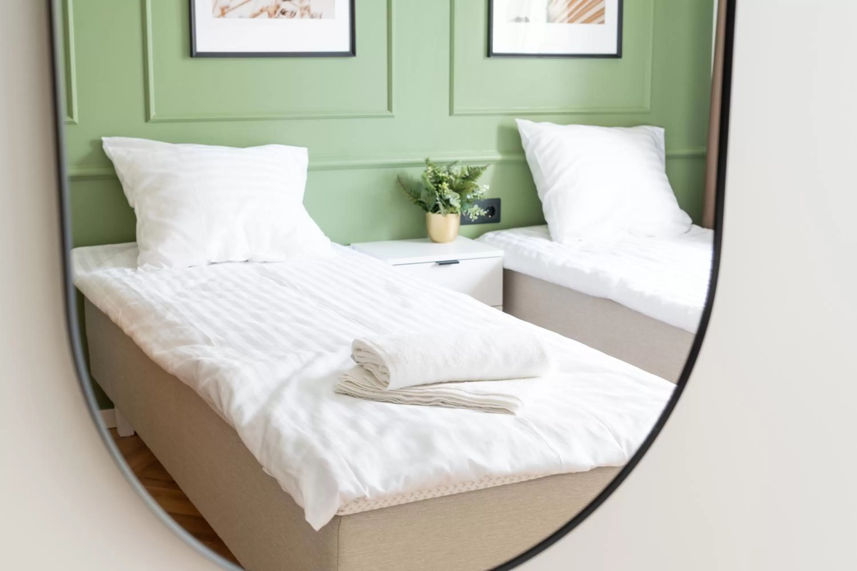 Bed in Oasis Airport Studios by RevalHome