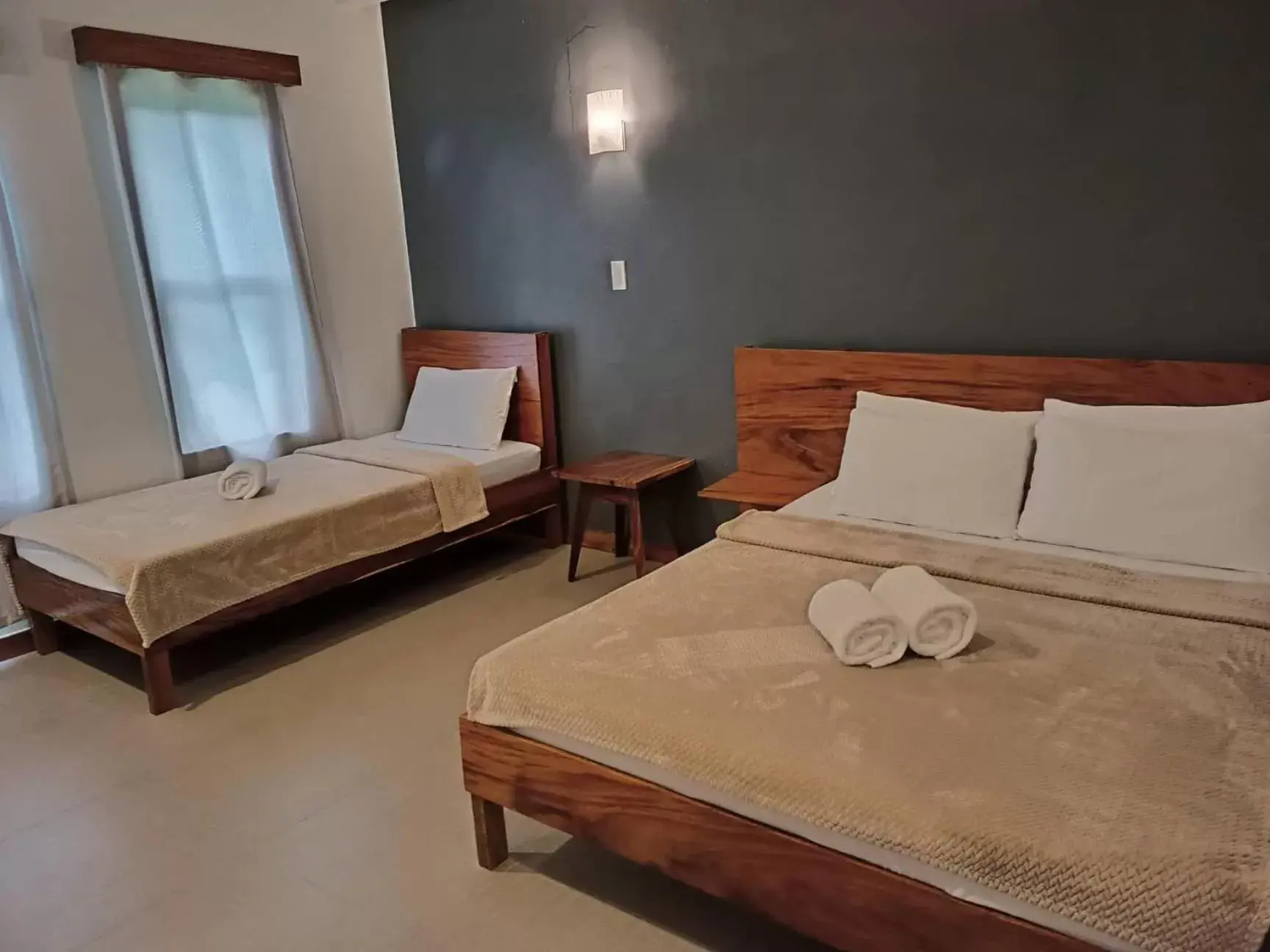 Family Room with Private Bathroom in Acacia Garden Inn and Suites Family Room with Private Bathroom in Acacia Garden Inn and Suites