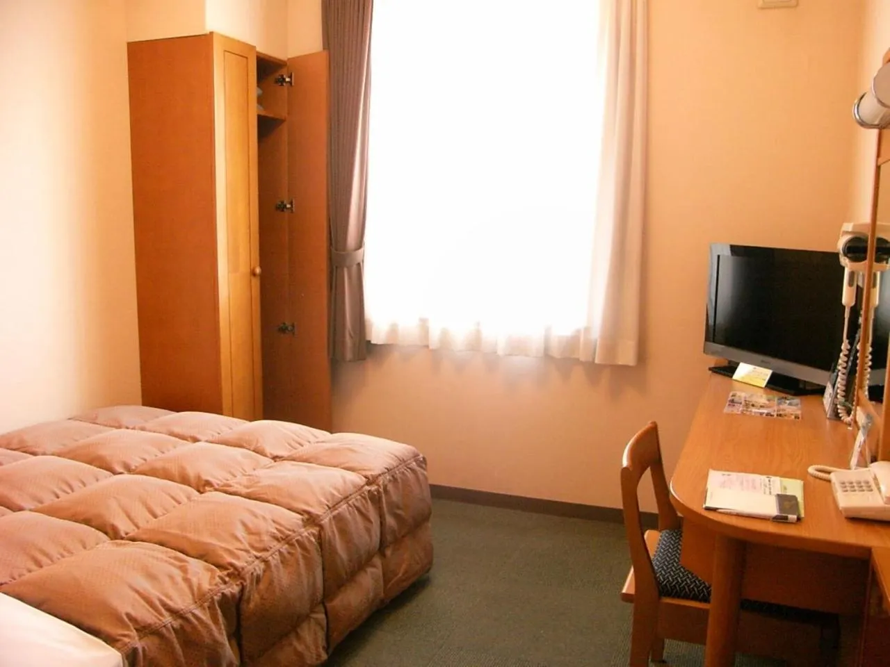 Photo of the whole room, Bed in Hotel Route-Inn Aso Kumamoto Airport Ekimae