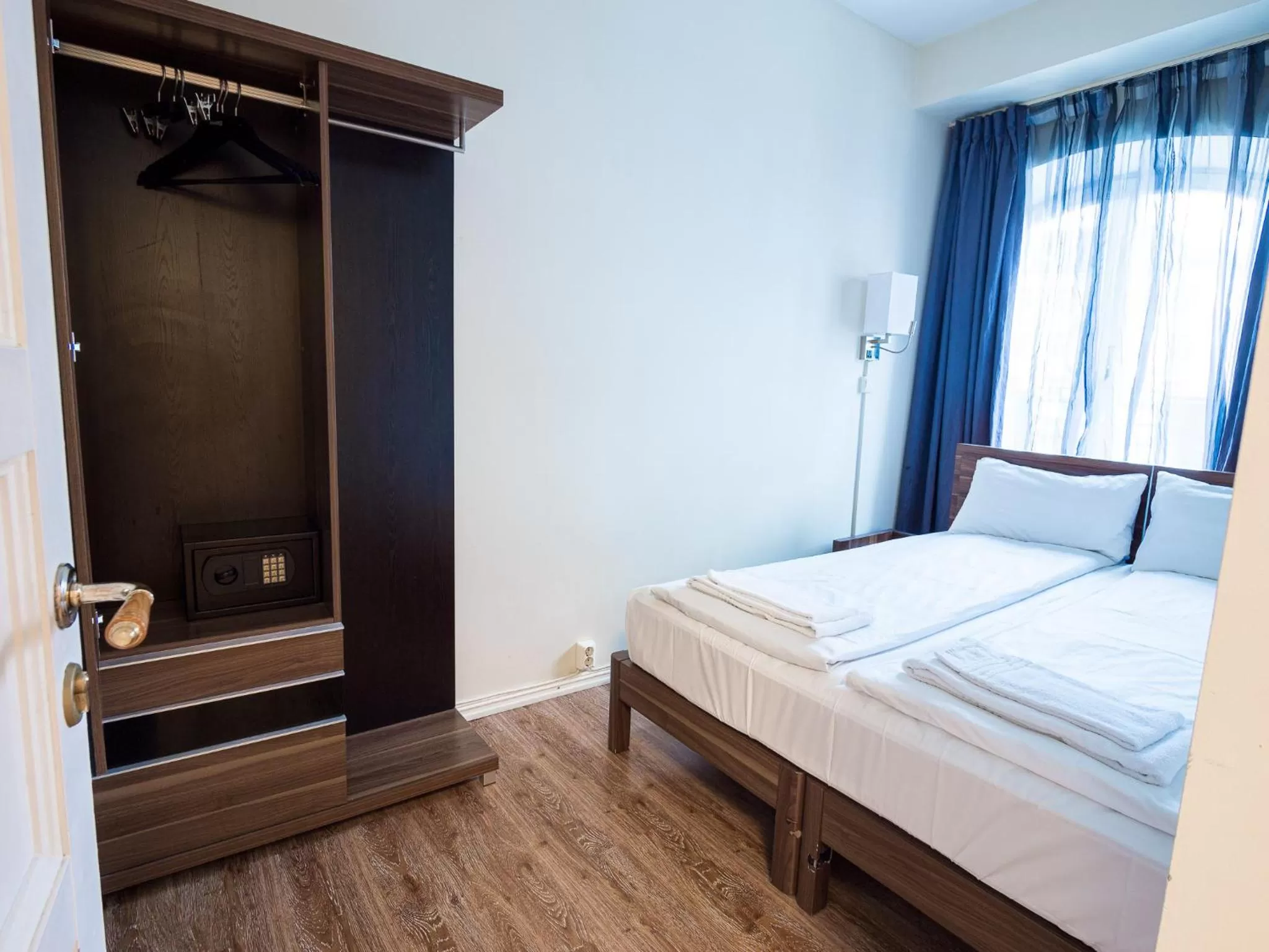 Bed in Central City Apartments