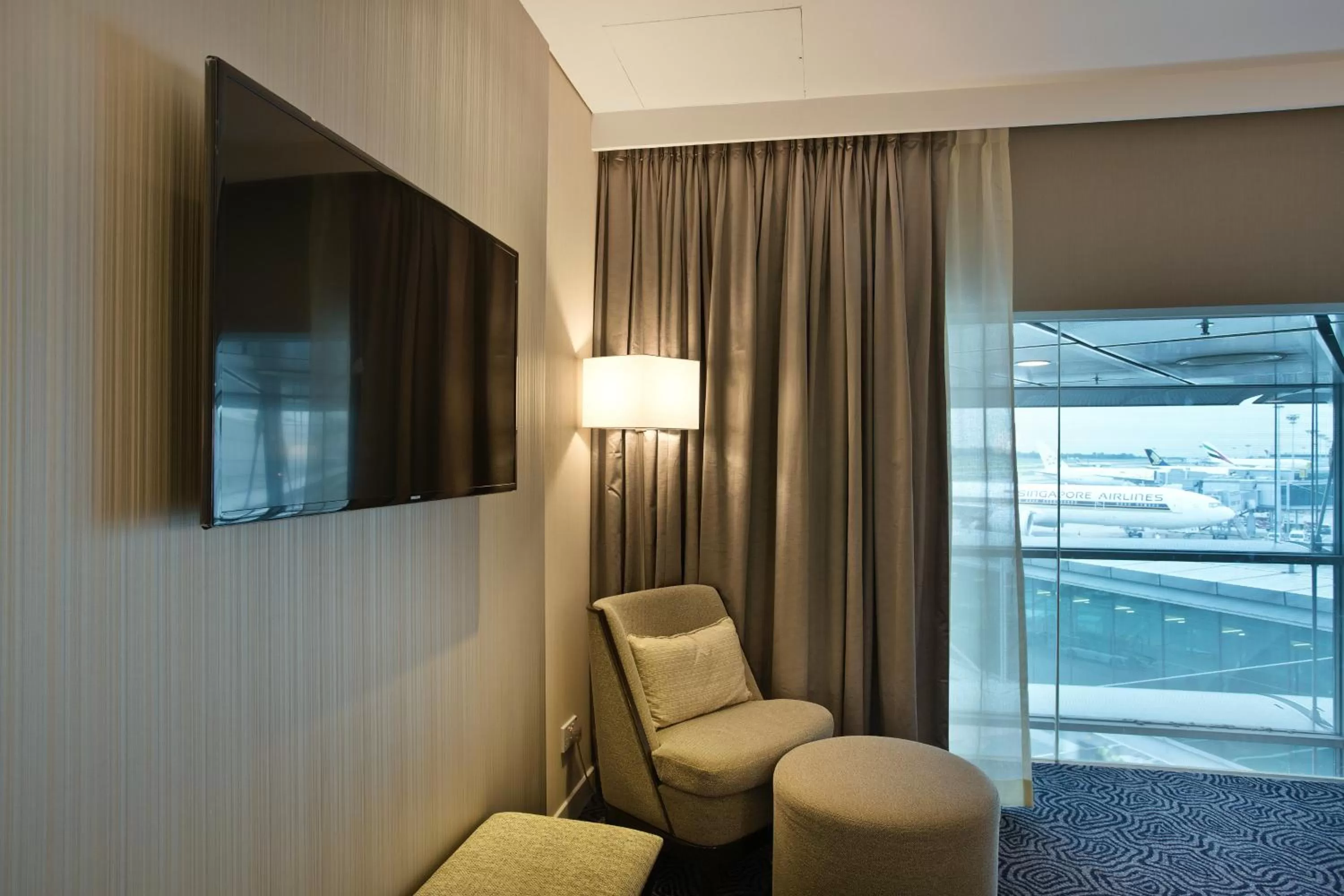 TV and multimedia in Ambassador Transit Hotel - Terminal 3