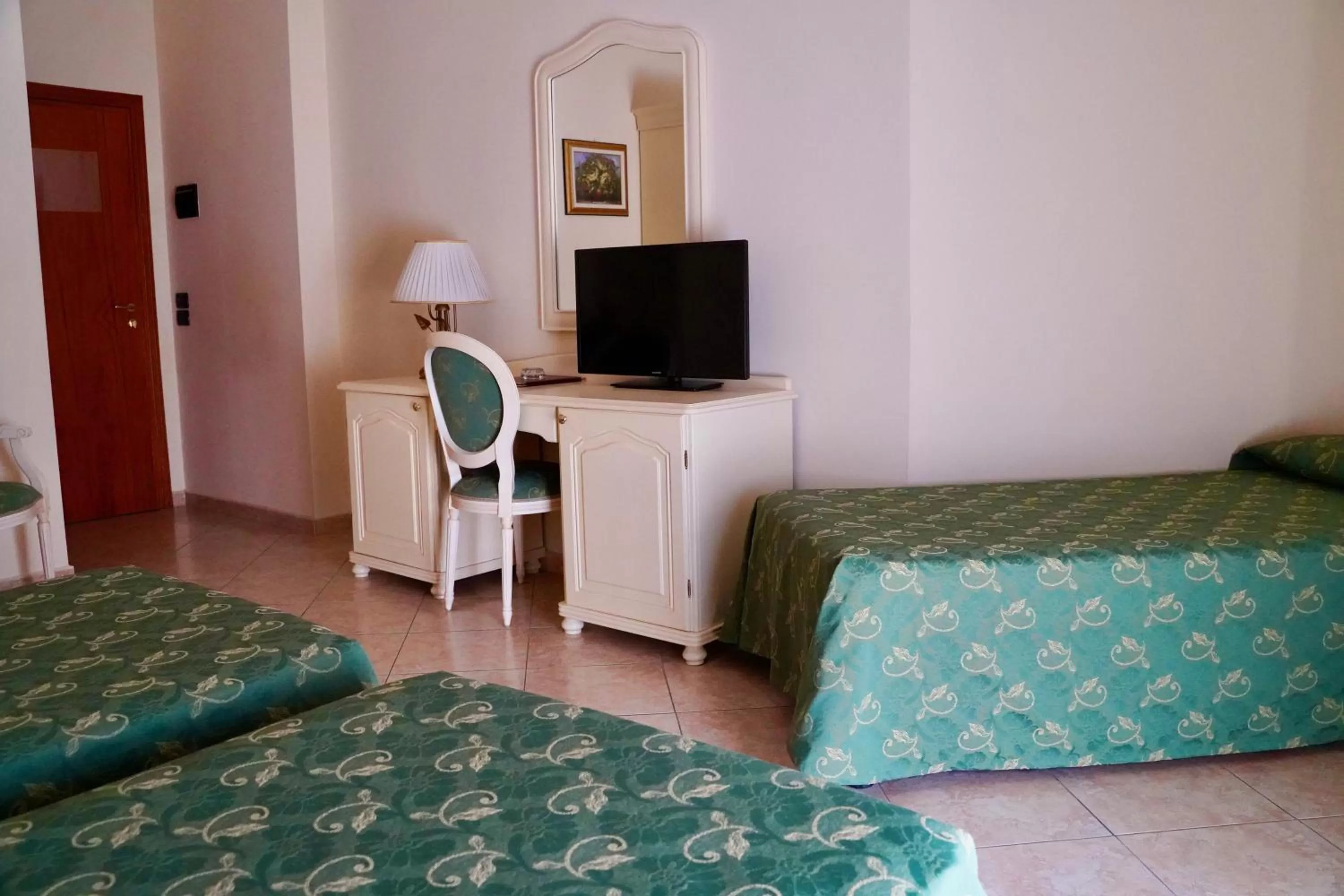 Bedroom in Hotel Roscianum Welness SPA