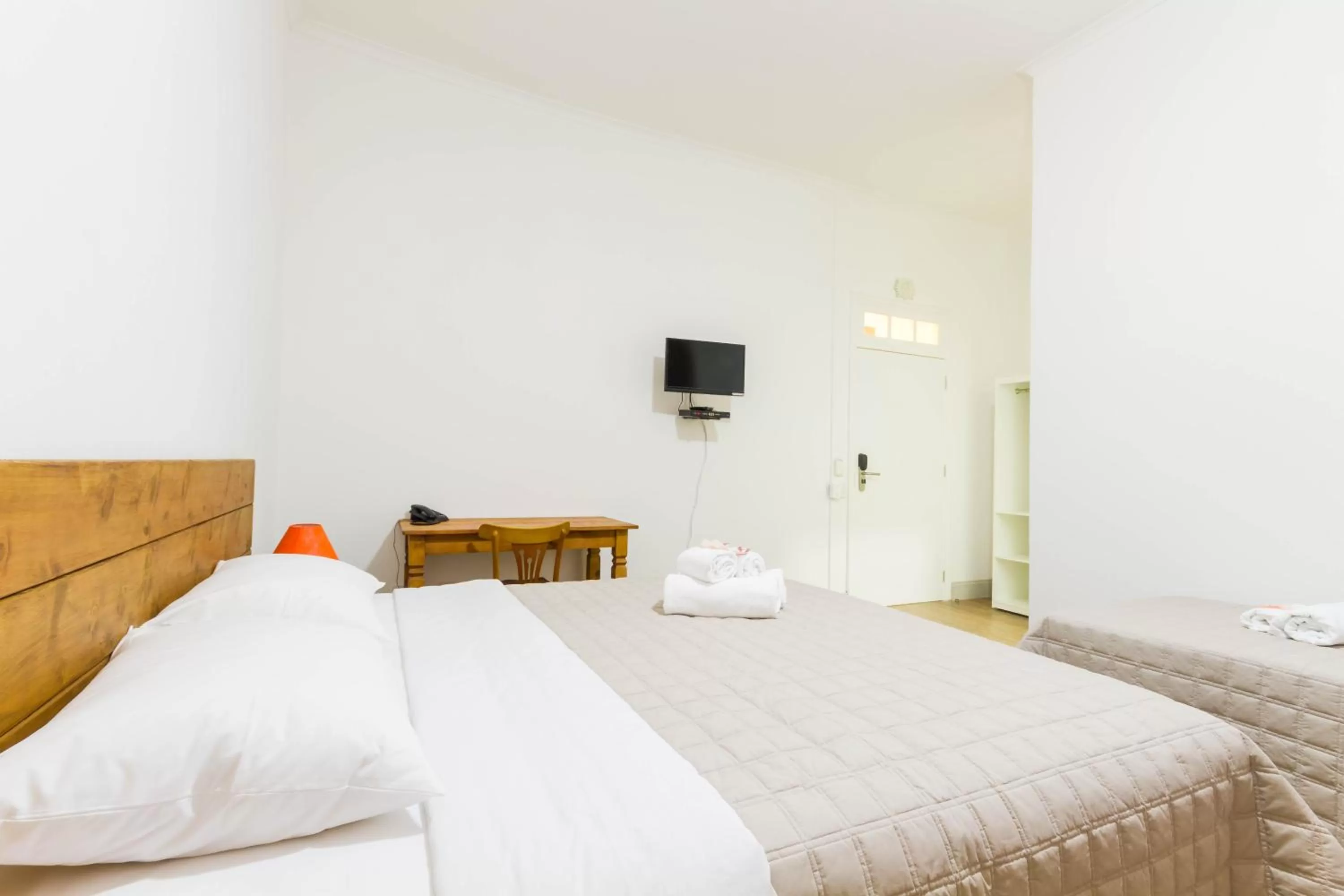 Bed in Pousada Sagrados Corações