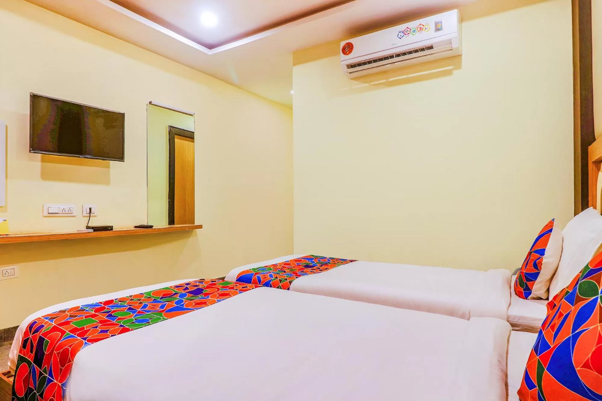 Photo of the whole room, Bed in FabHotel Keerthi's Anupama - Nr Indira Gandhi Stadium