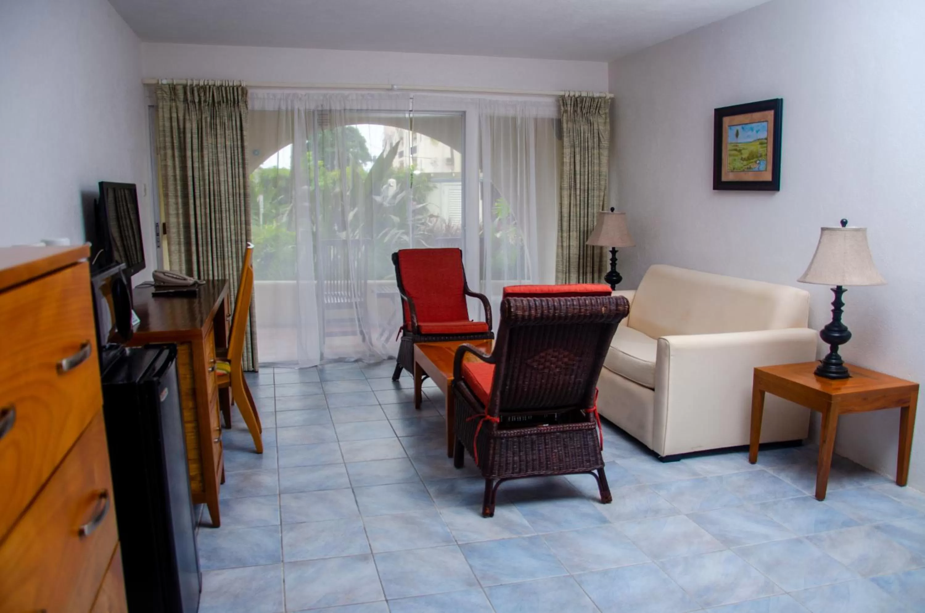 Communal lounge/ TV room, Seating Area in Infinity on the Beach