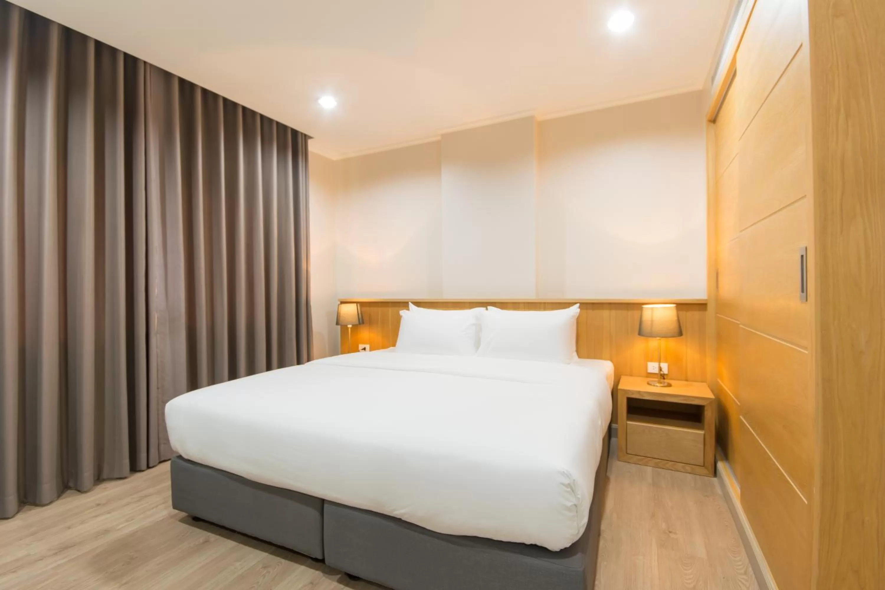 Bed in Jasmine Resort Sriracha