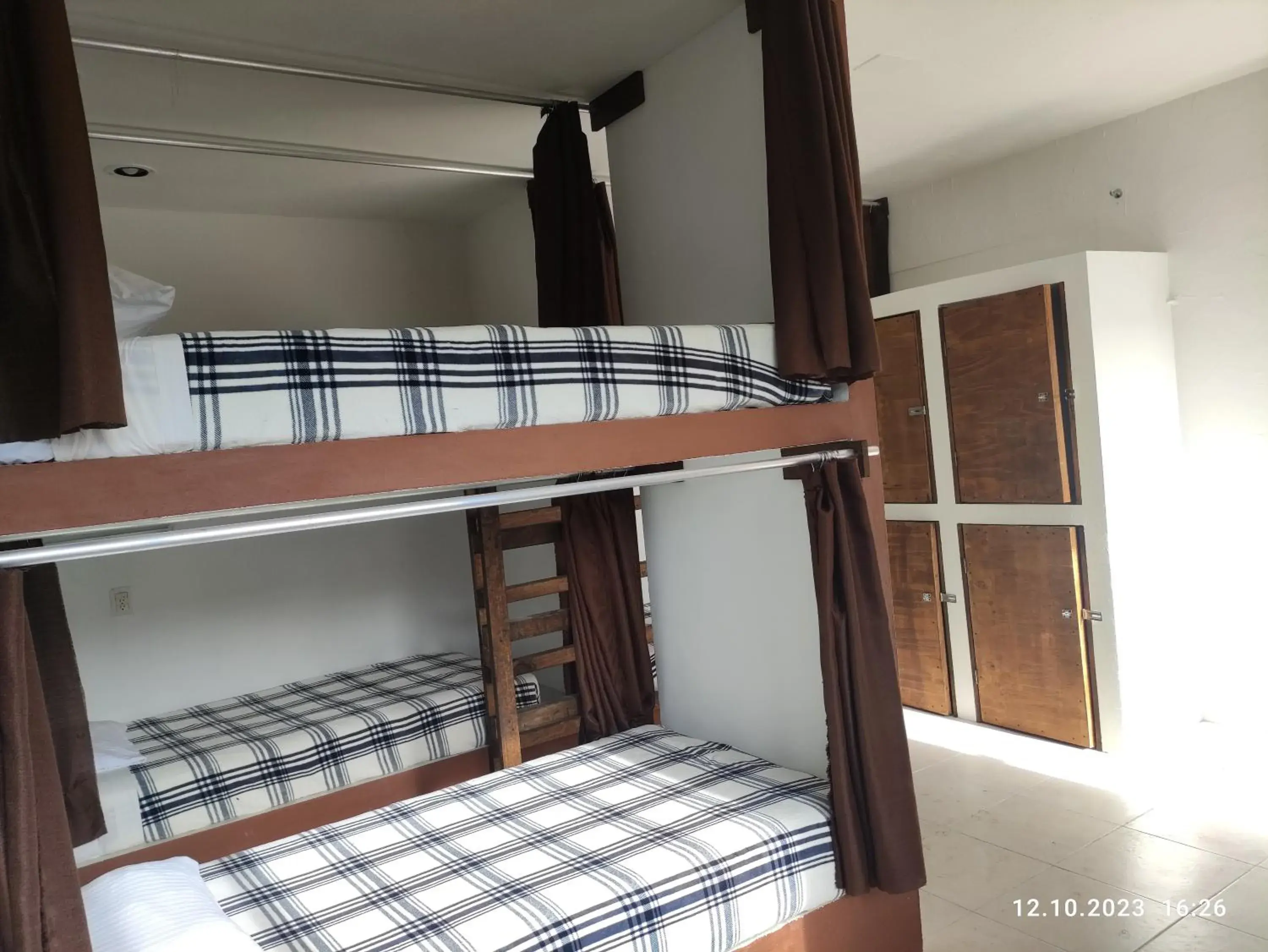 Bunk Bed in Male Dormitory Room in Lucky Traveler Hostel Bunk Bed in Male Dormitory Room in Lucky Traveler Hostel