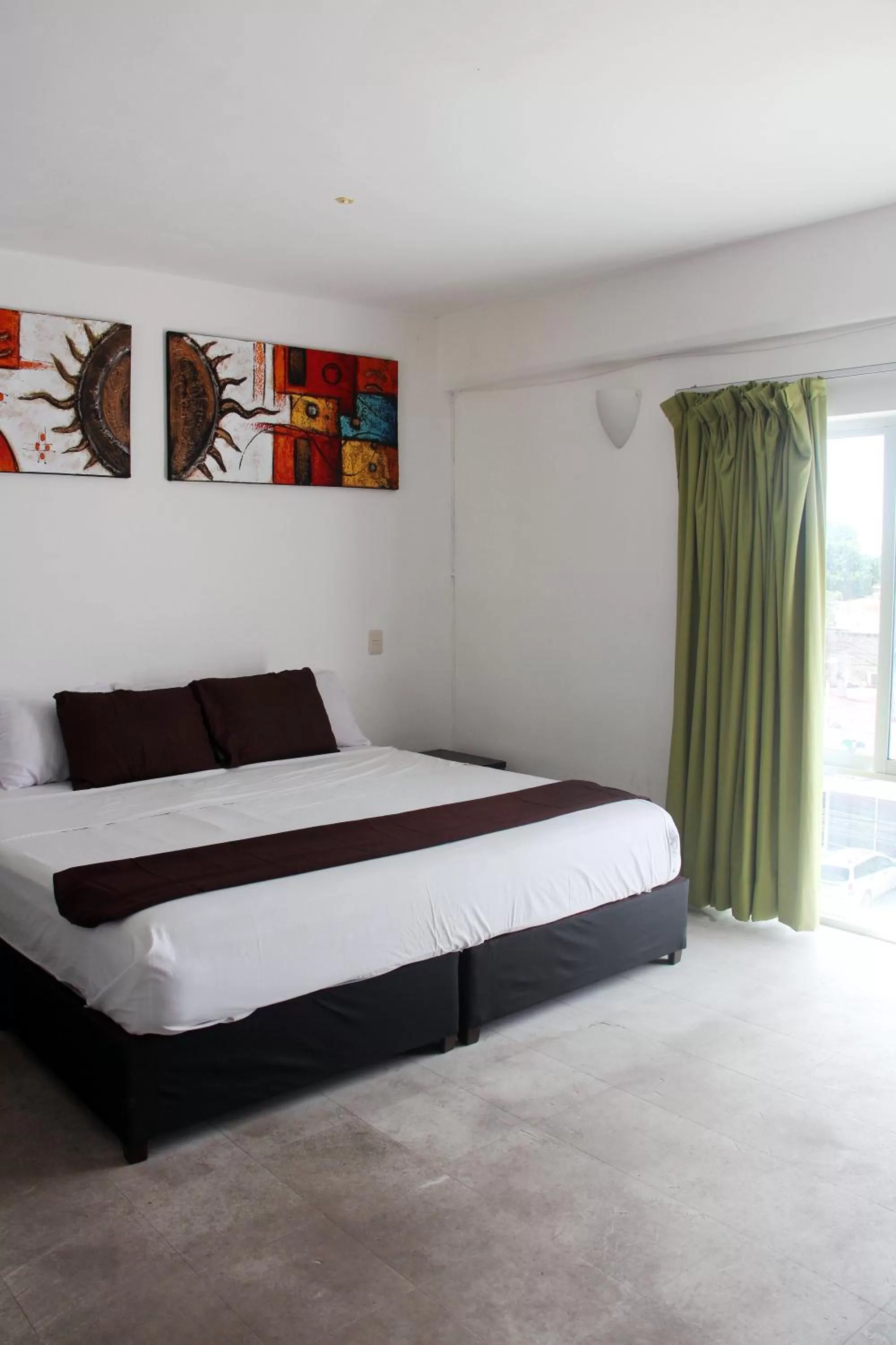 Photo of the whole room, Bed in Hotel & Hostal Casa de Luz Cancun