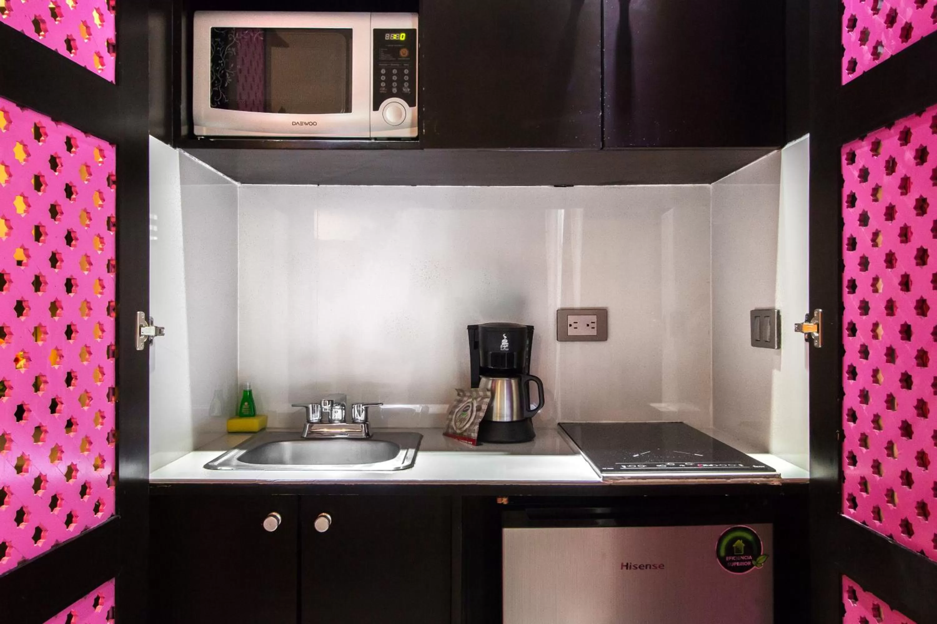 Kitchen or kitchenette in Suites Corazon