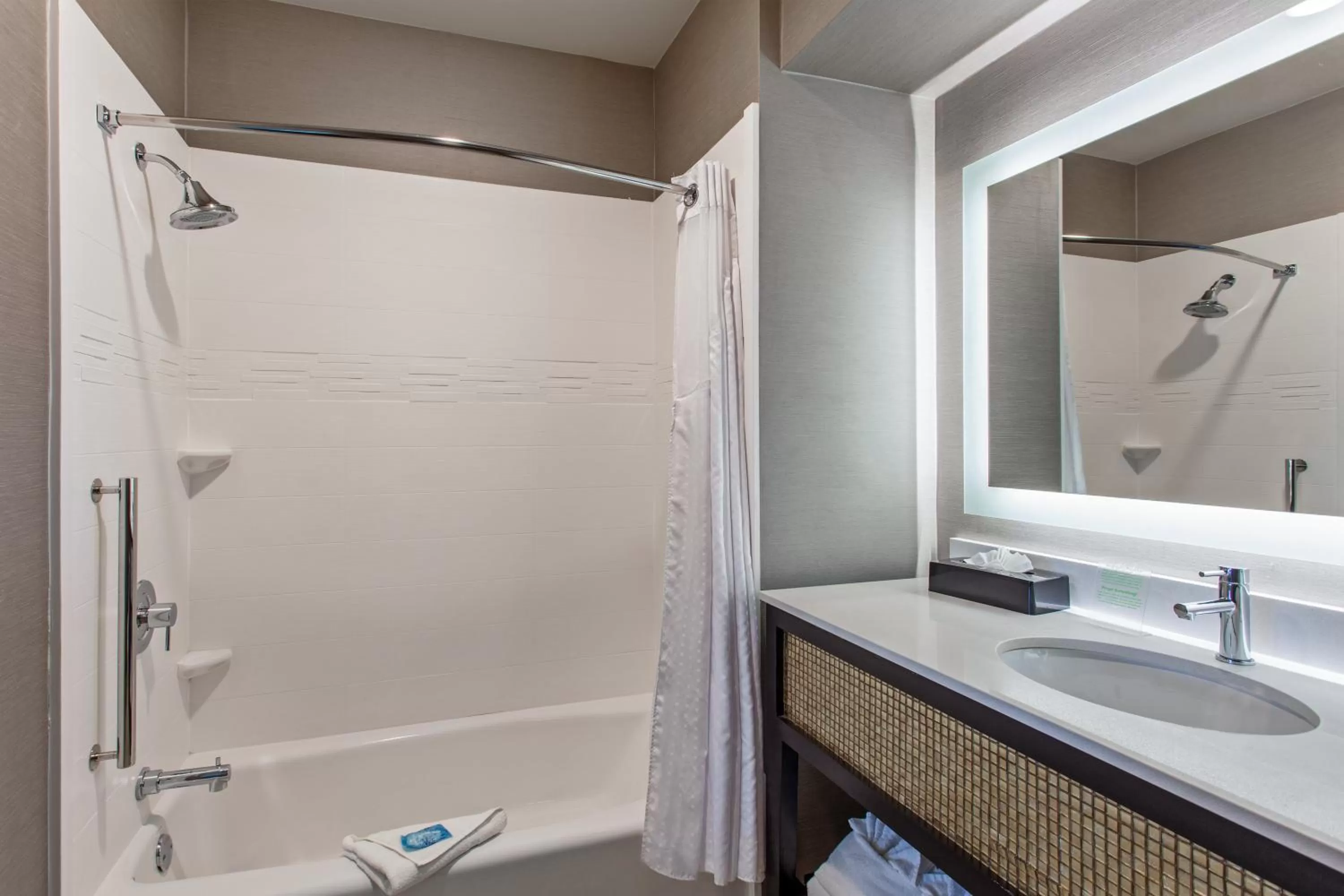 Bathroom in Holiday Inn Express & Suites Anaheim Resort Area by IHG