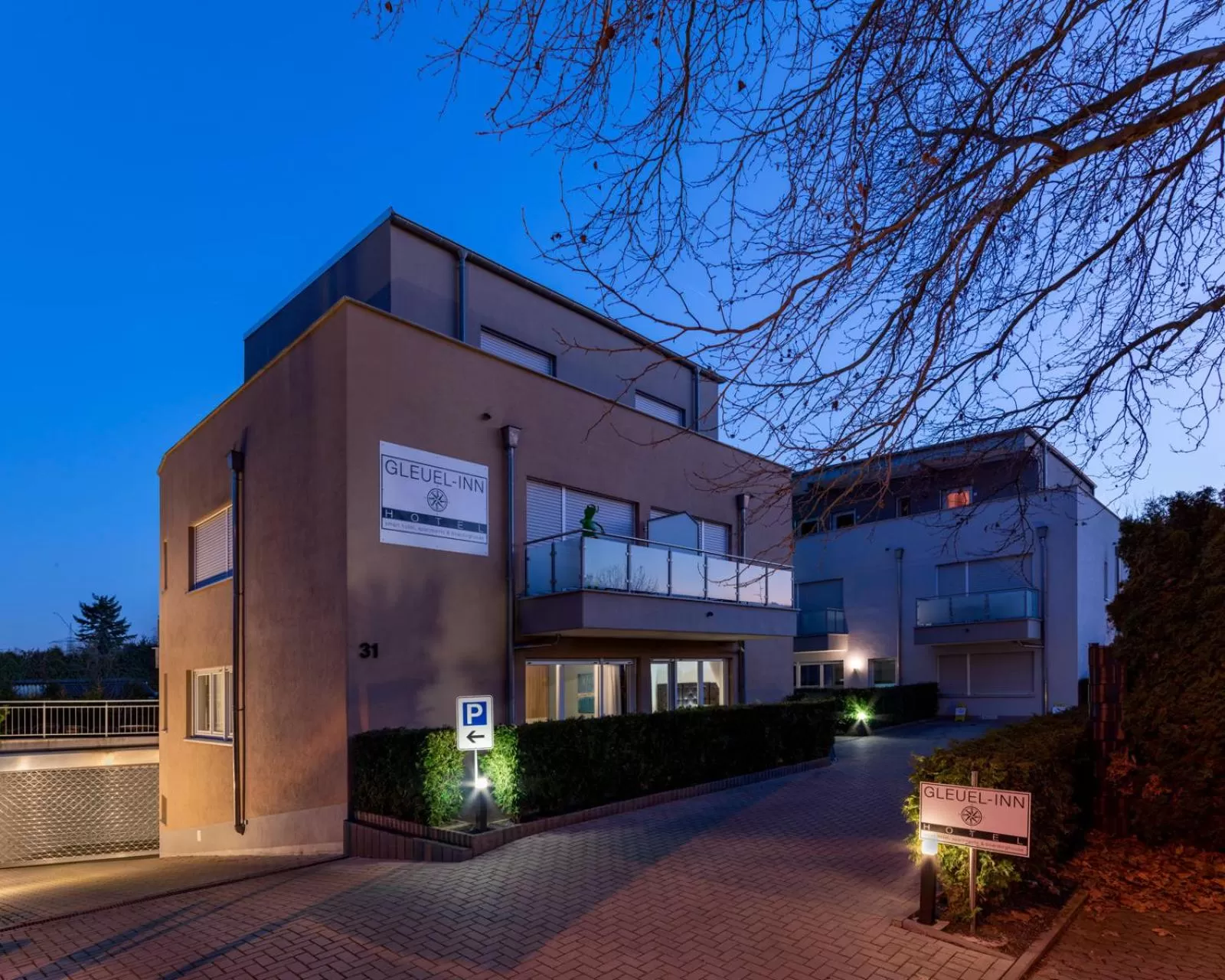 Property Building in GLEUEL INN - digital hotel & serviced apartments & boardinghouse mit voll ausgestatteten Küchen