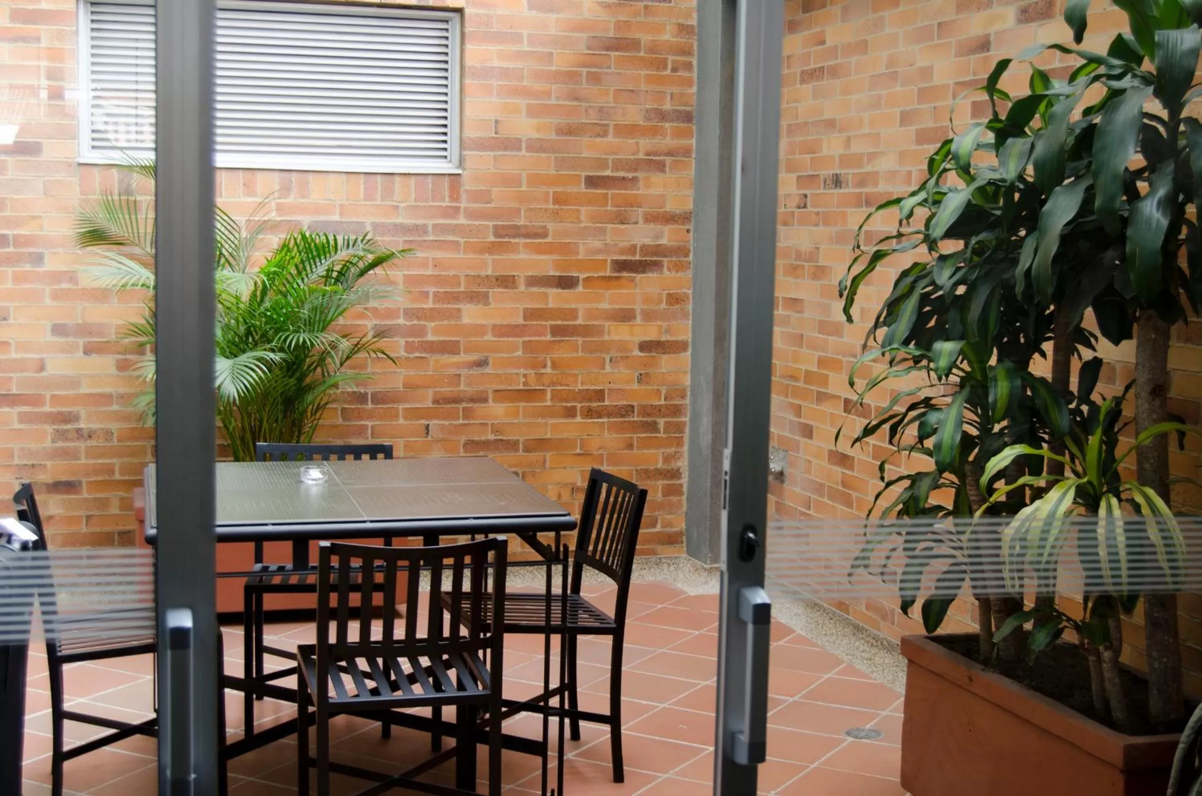 Patio in 122 Plaza Apartahotel