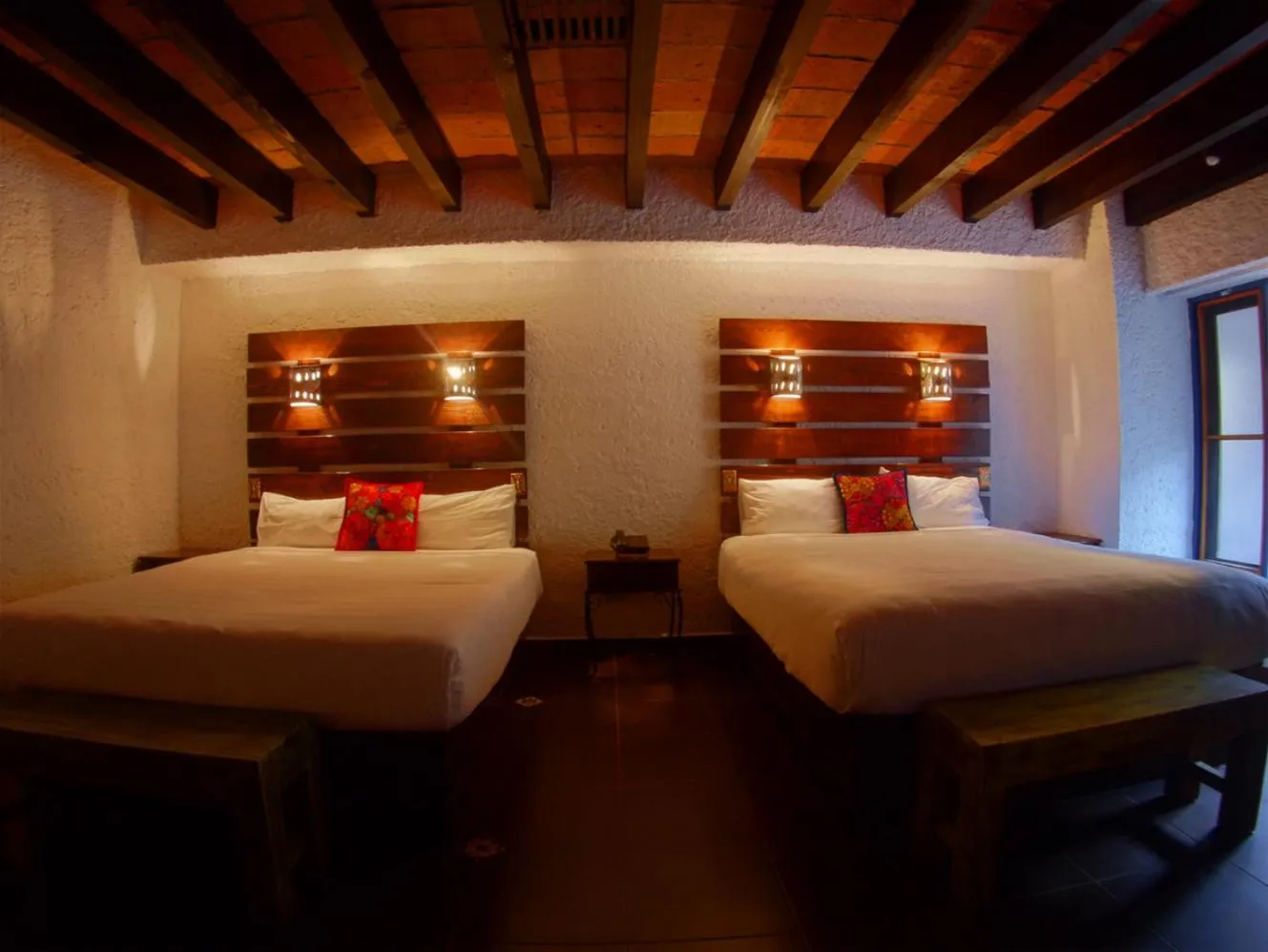 Bed in Las Rocas Resort & Spa