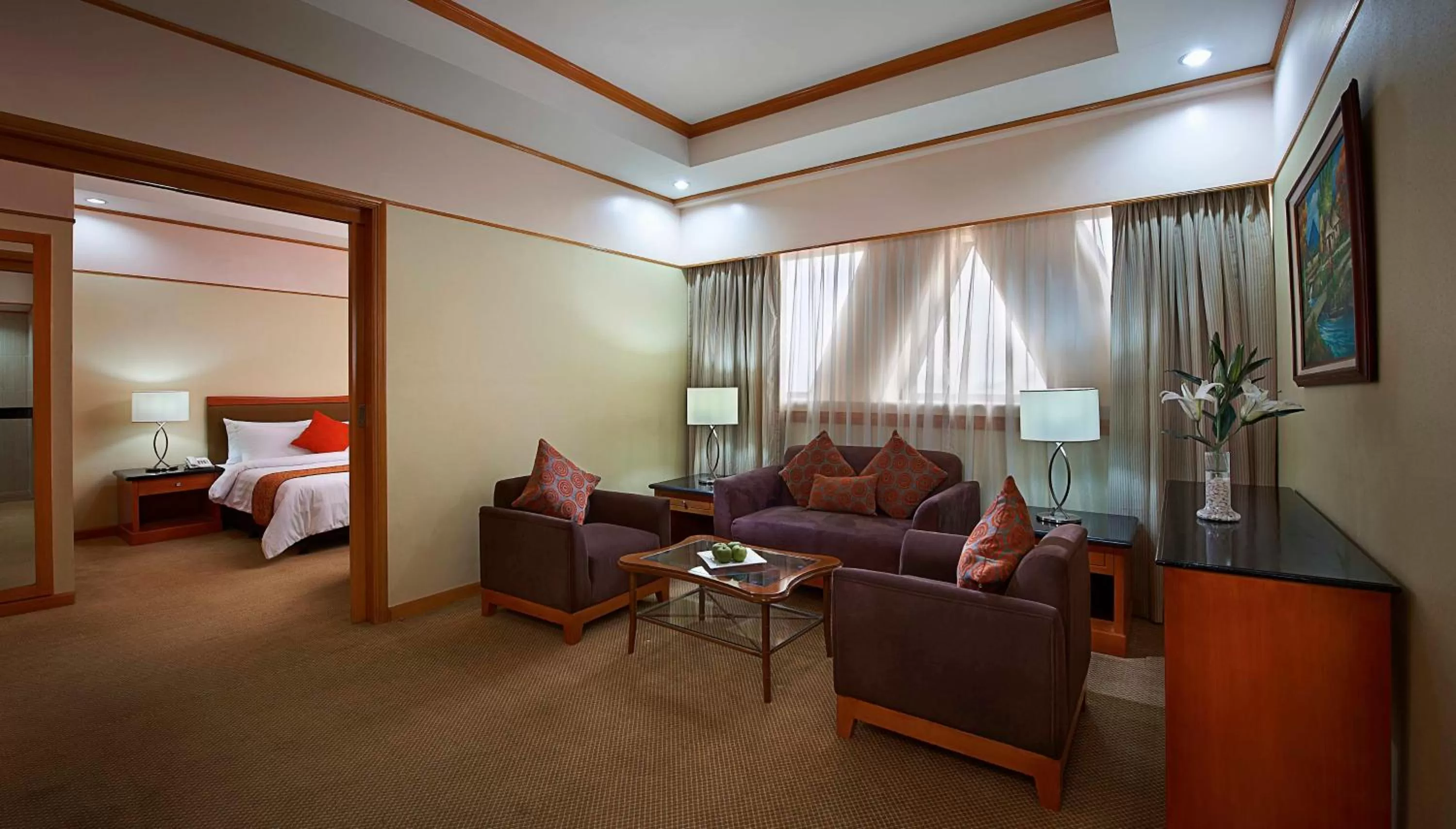 Seating area, Bed in Berjaya Makati Hotel