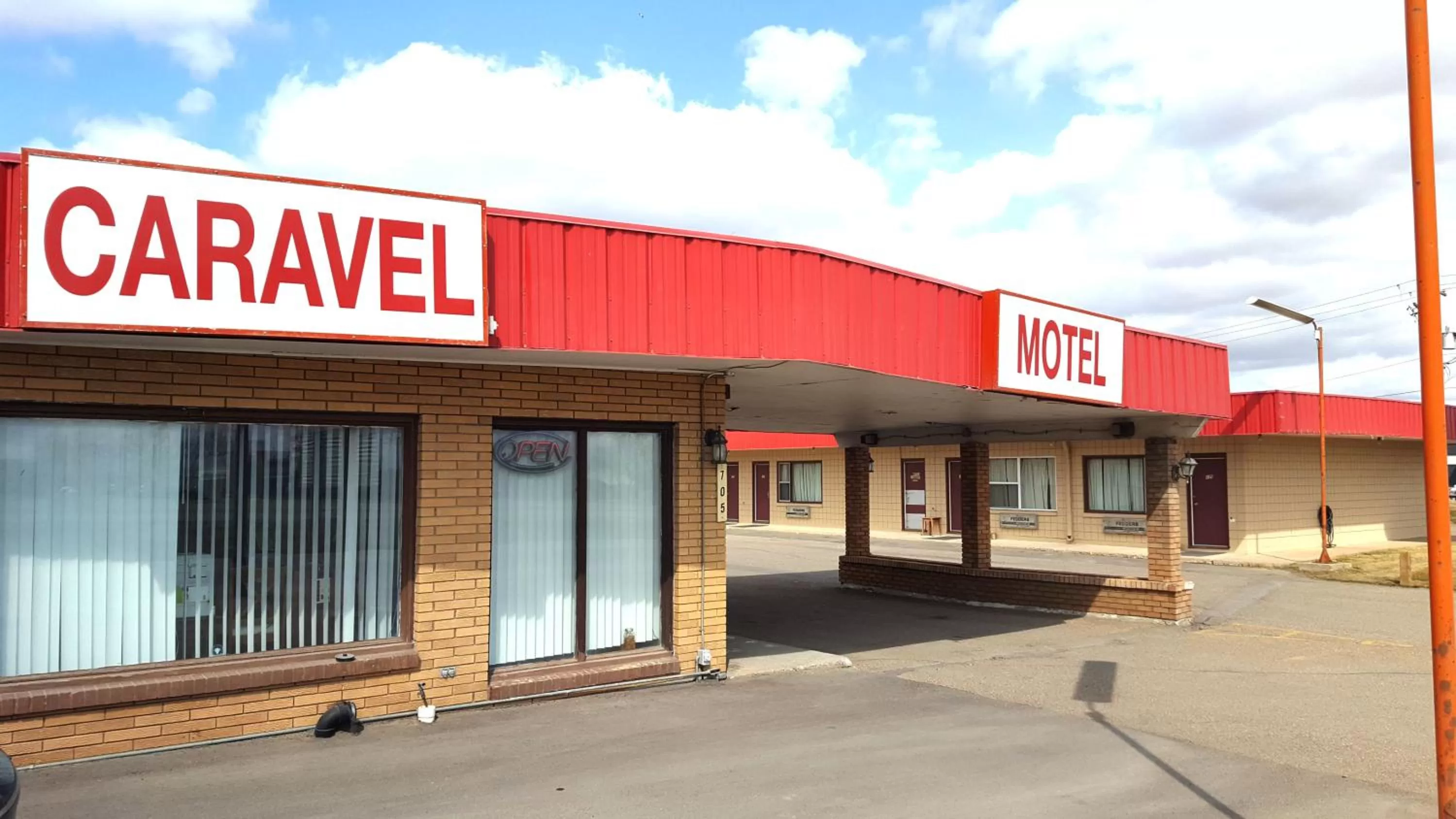 Property logo or sign in Caravel Motel