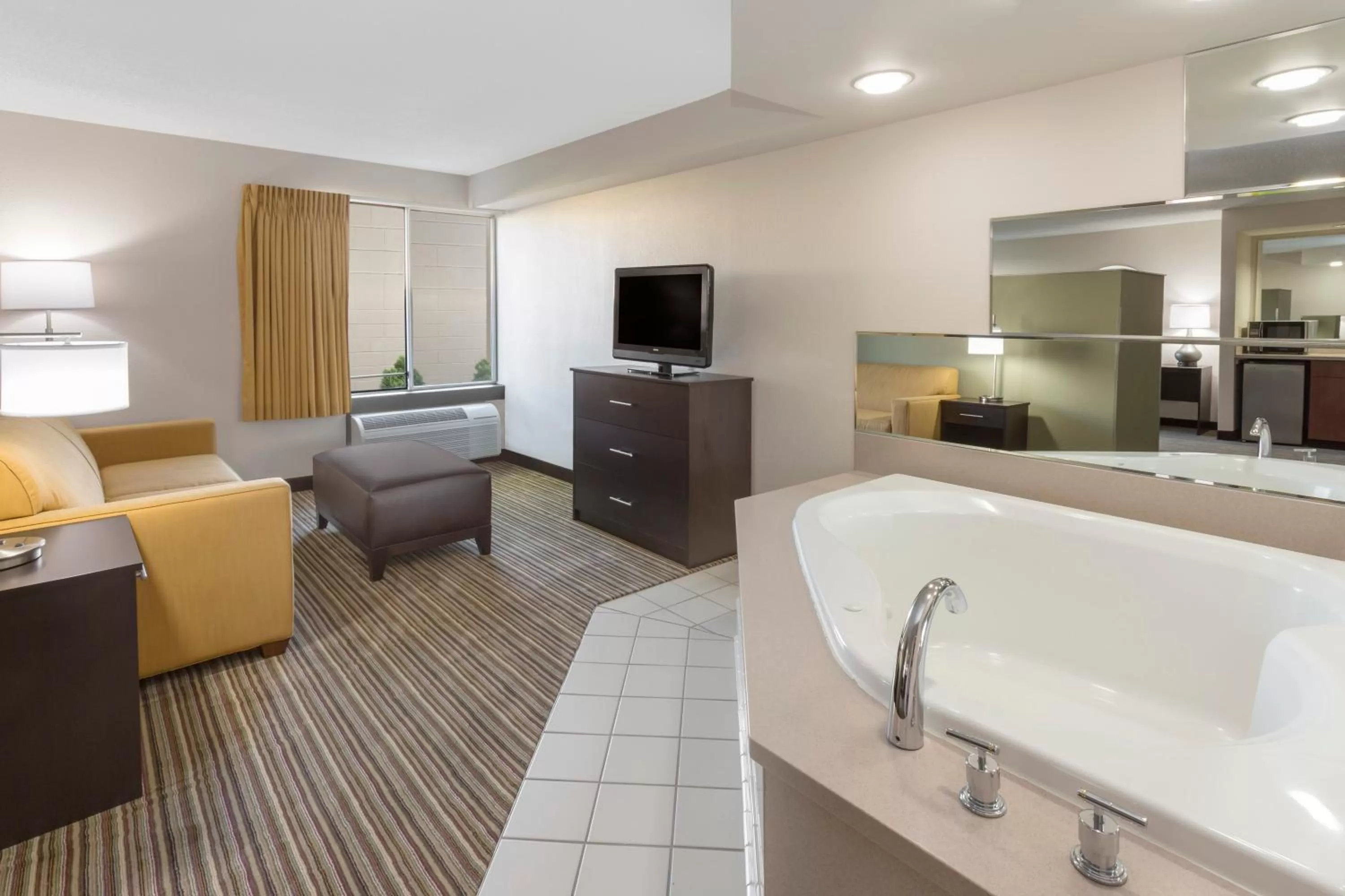 Living room in Super 8 by Wyndham Madison South