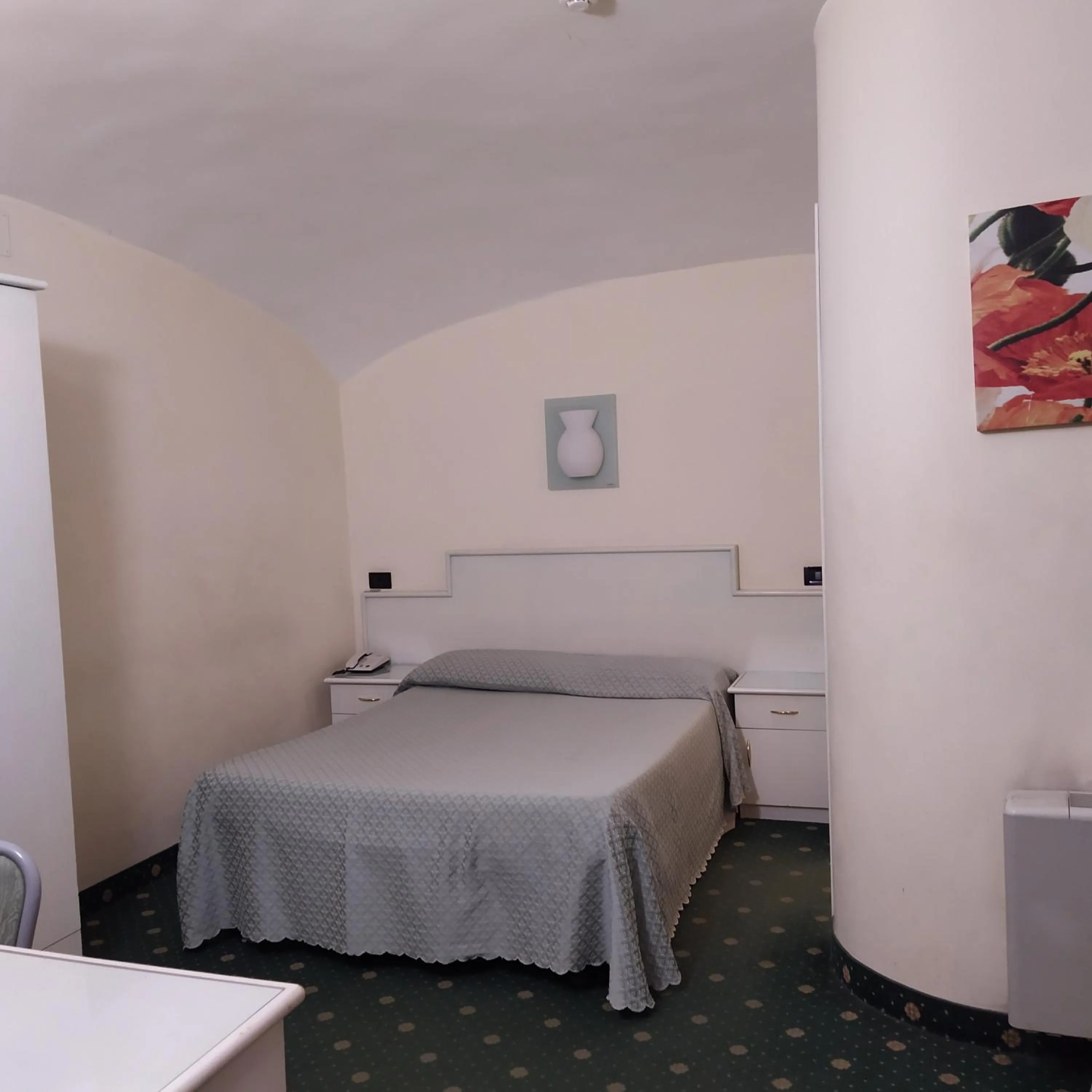 Bed in Hotel Priscilla