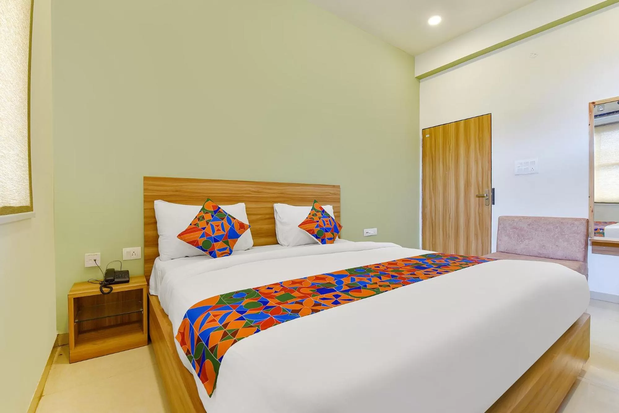 Bed in FabHotel Prime Oxus