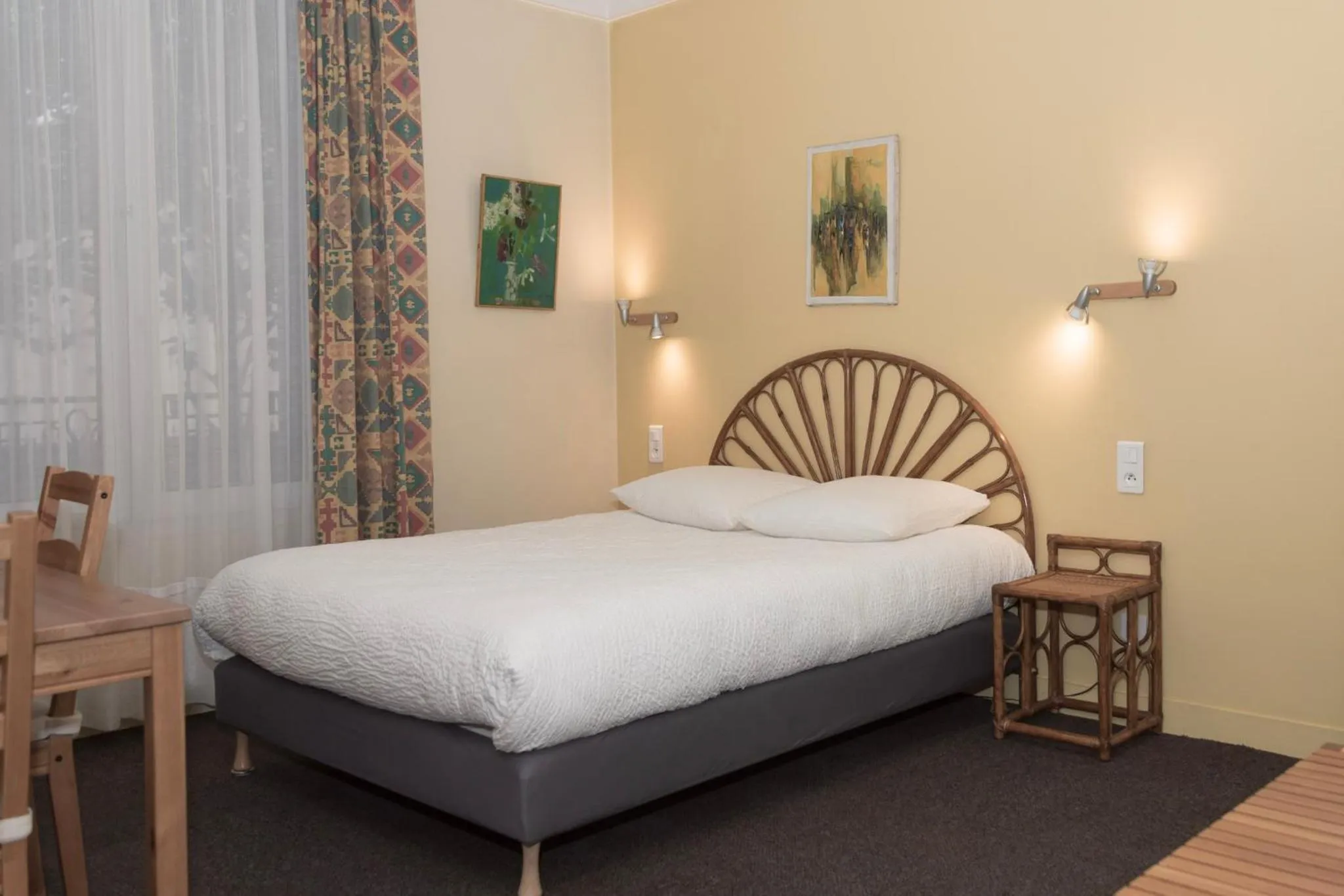 Decorative detail, Bed in Cit'Hotel Aéro-Hotel