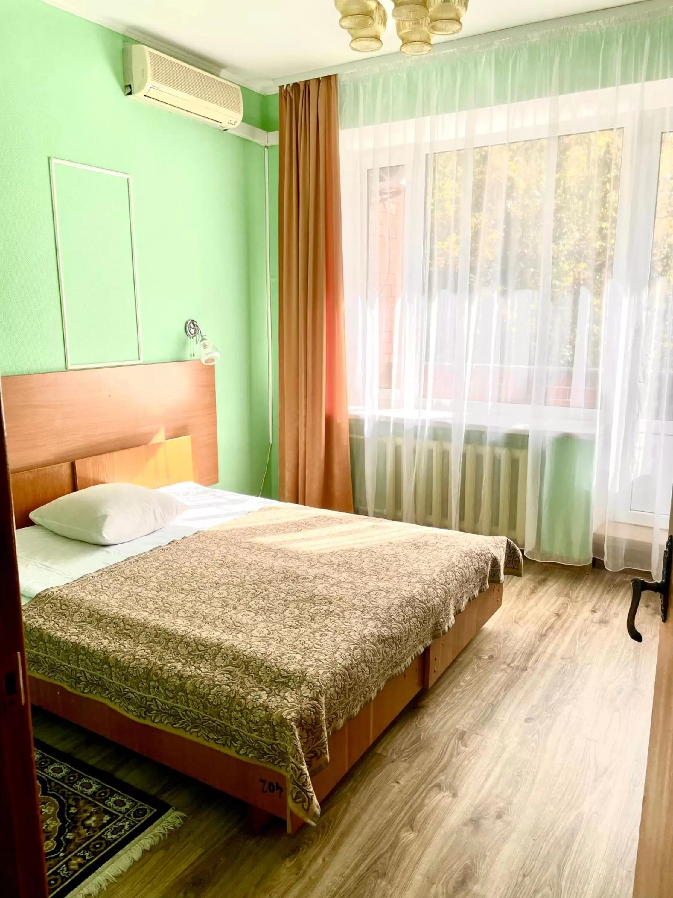 Bed in Hotel Prydesnyansky