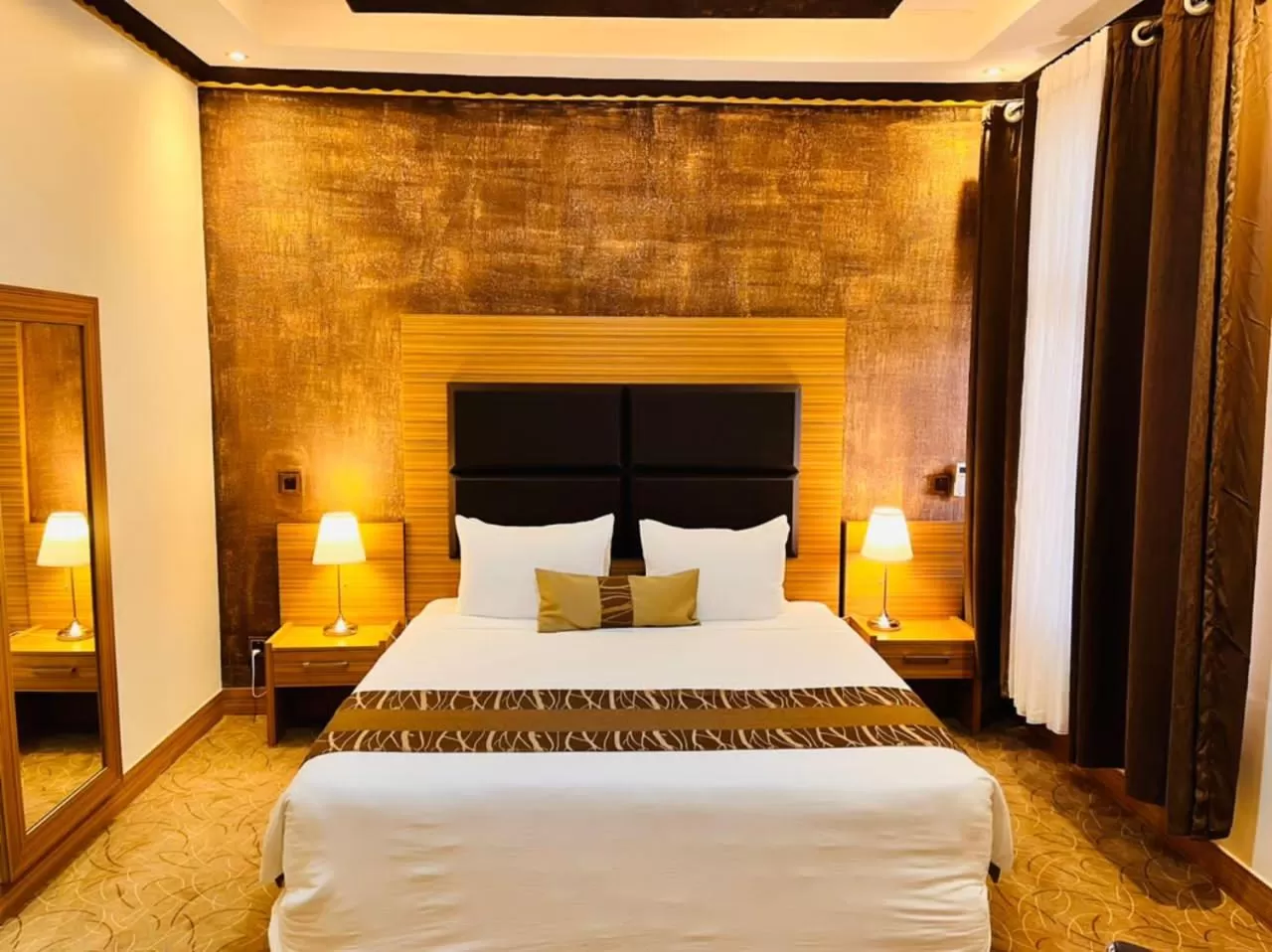 Bed in Ndaru Luxury Suites