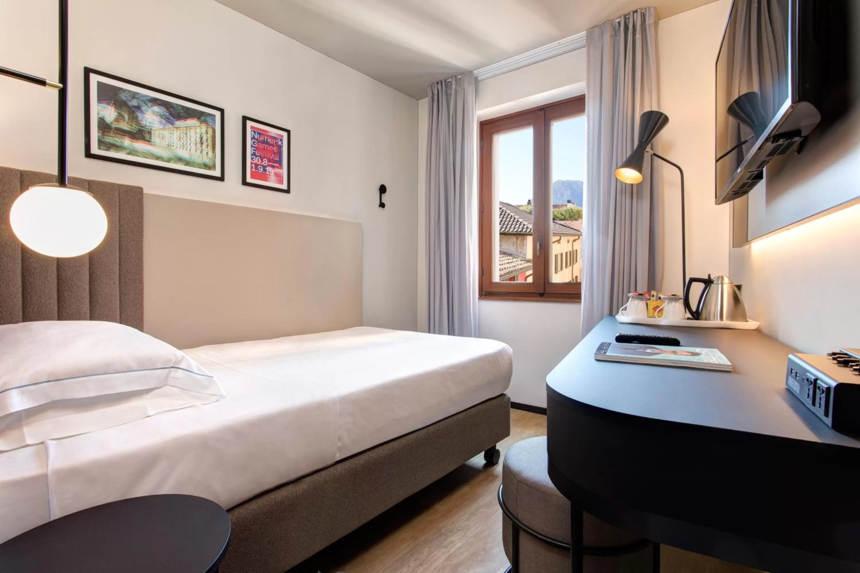 Basic room with air conditioning in LUGANODANTE Boutique & Lifestyle Hotel