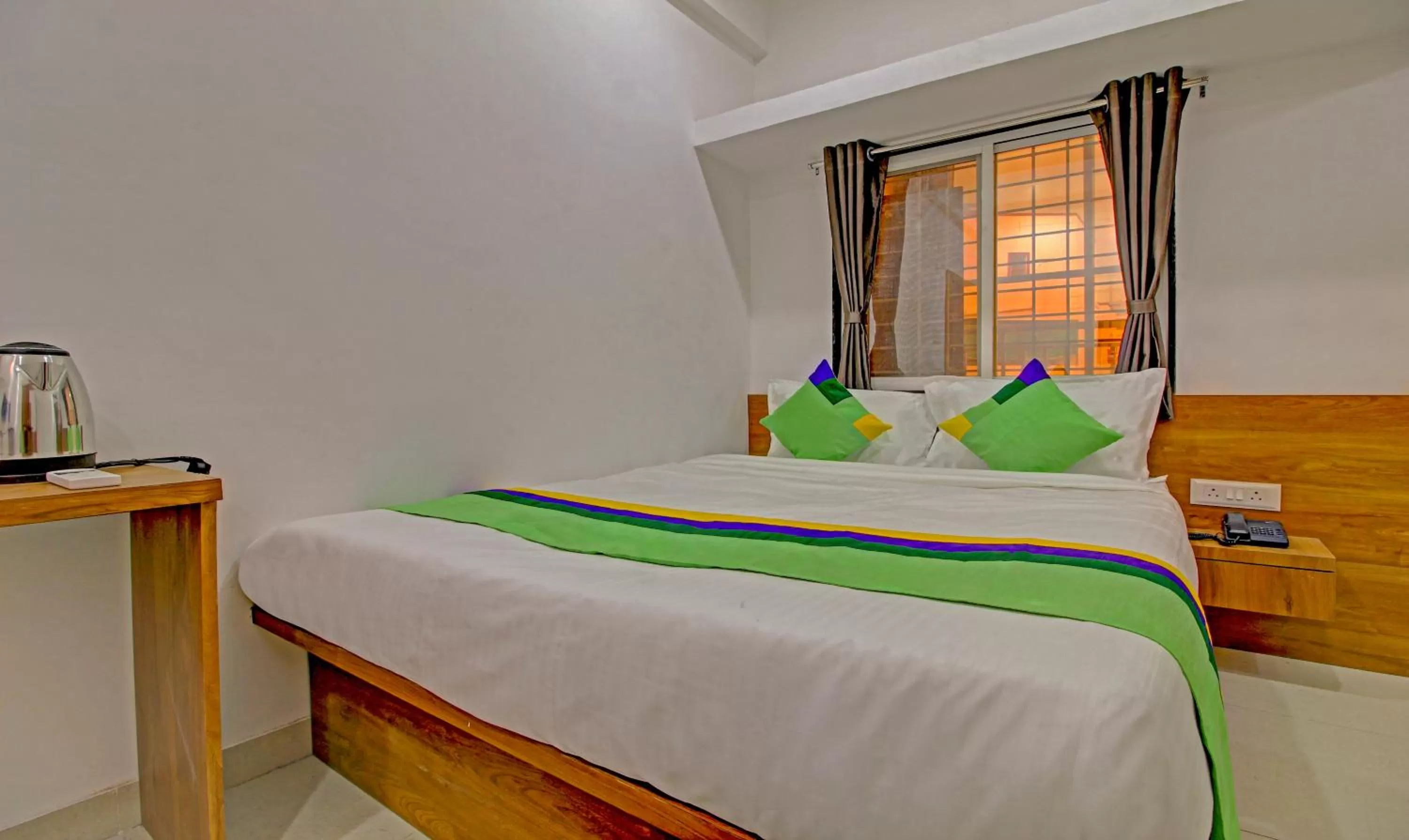 Bed in Treebo Trend White House