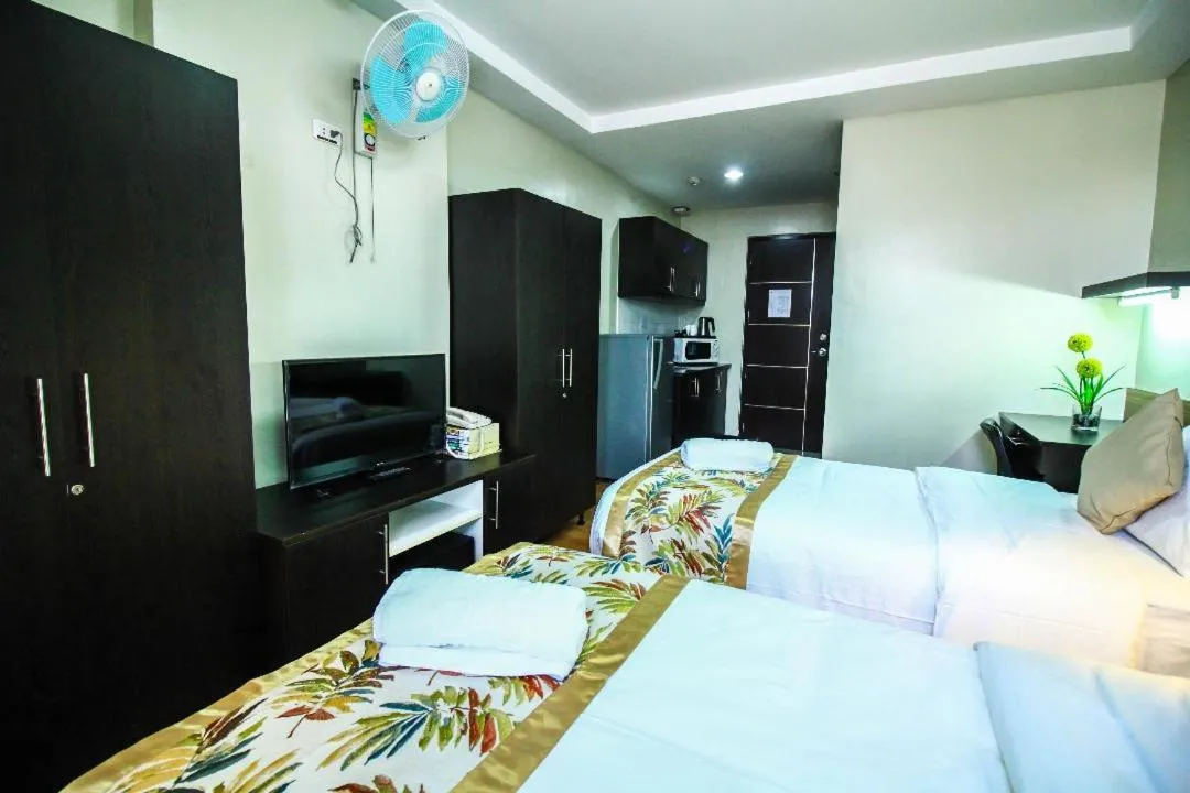 Bed in The Studio 87 Residences