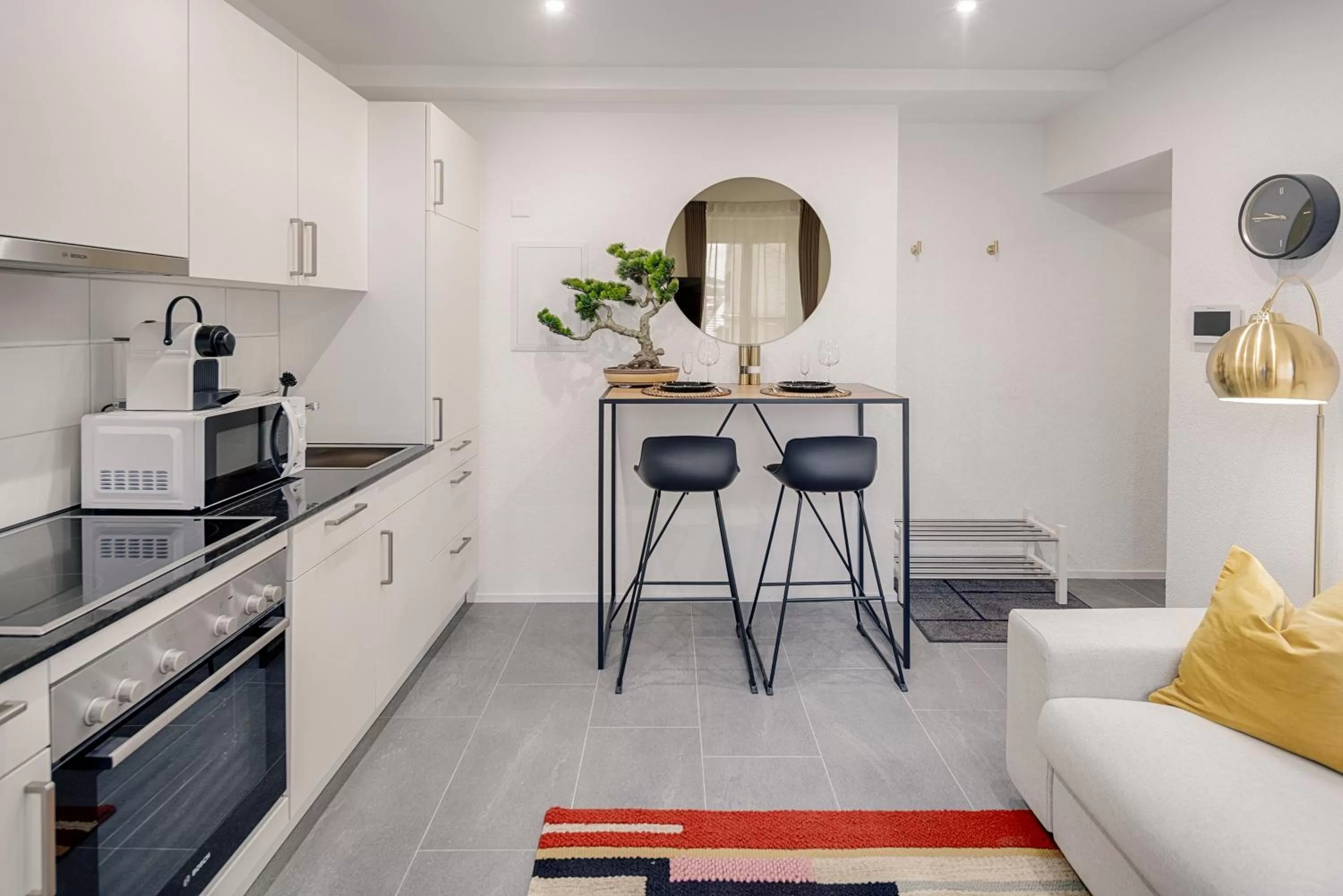 Kitchen or kitchenette in VISIMO Apartments St Georgen-Strasse St Gallen - Design City Nature