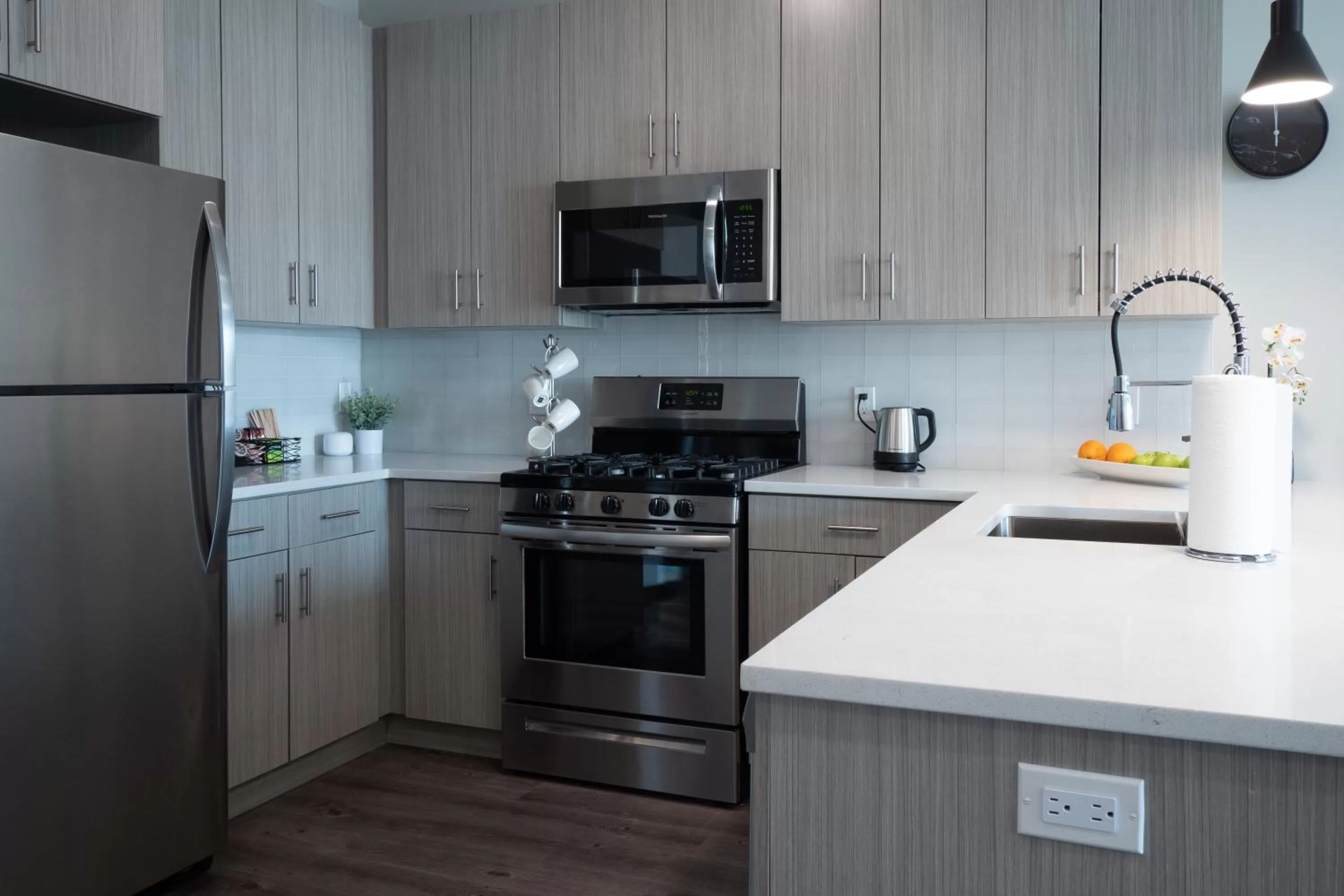 Kitchen or kitchenette in Luxury Furnished Apartments by Hyatus Downtown at Yale