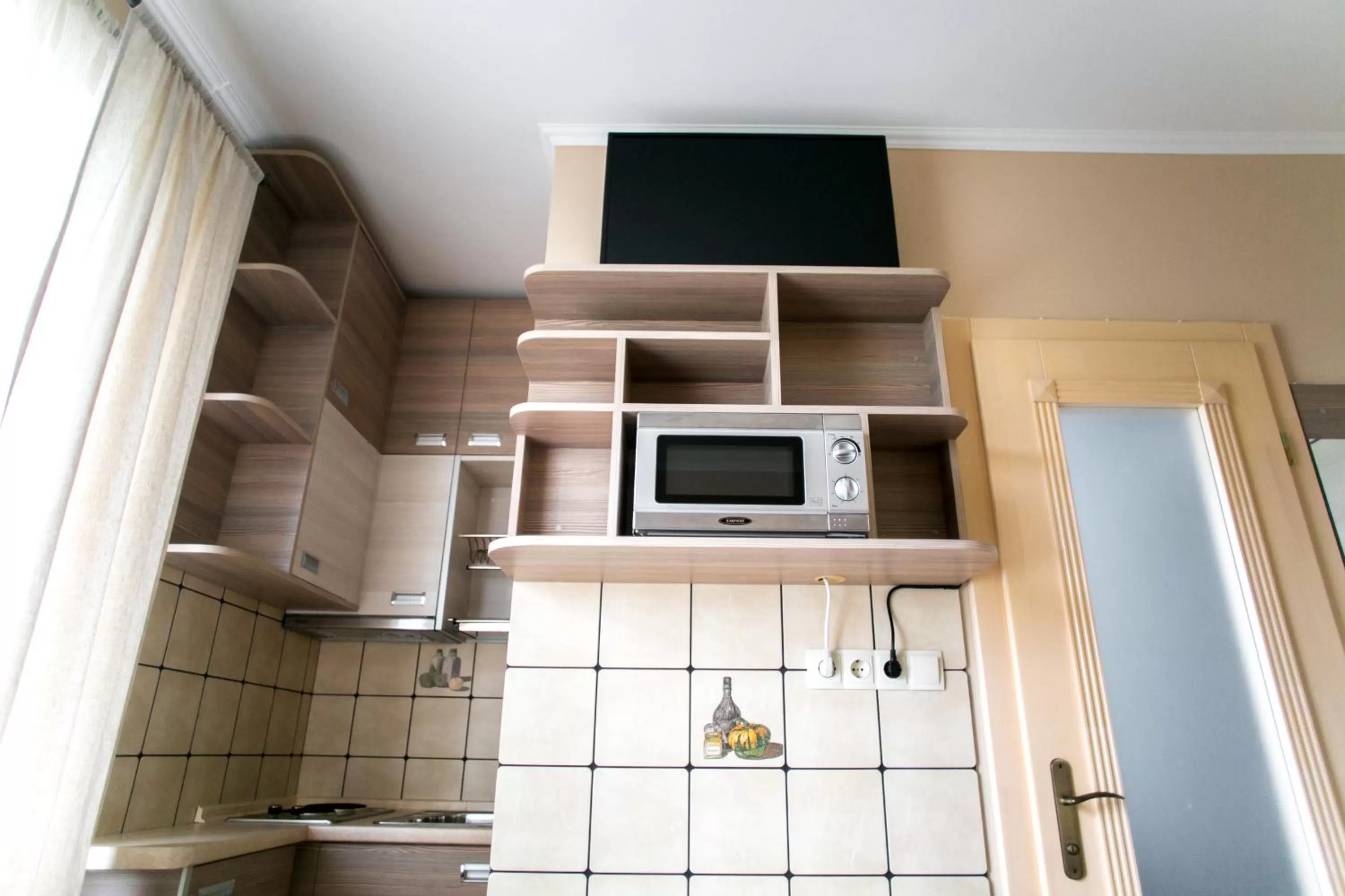 Kitchen/Kitchenette in Tulipan Hotel Aquapark