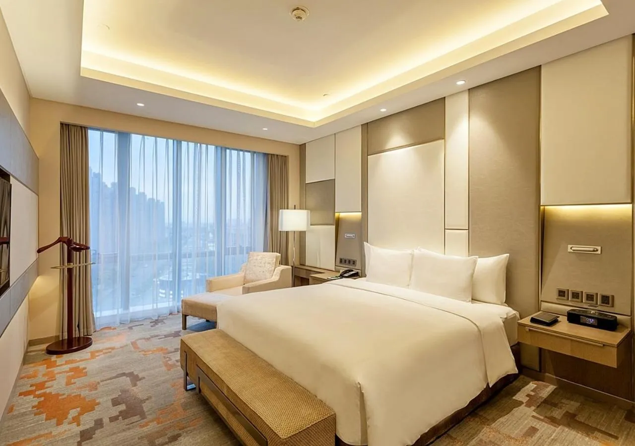 Photo of the whole room, Bed in Radisson Exhibition Center Shanghai
