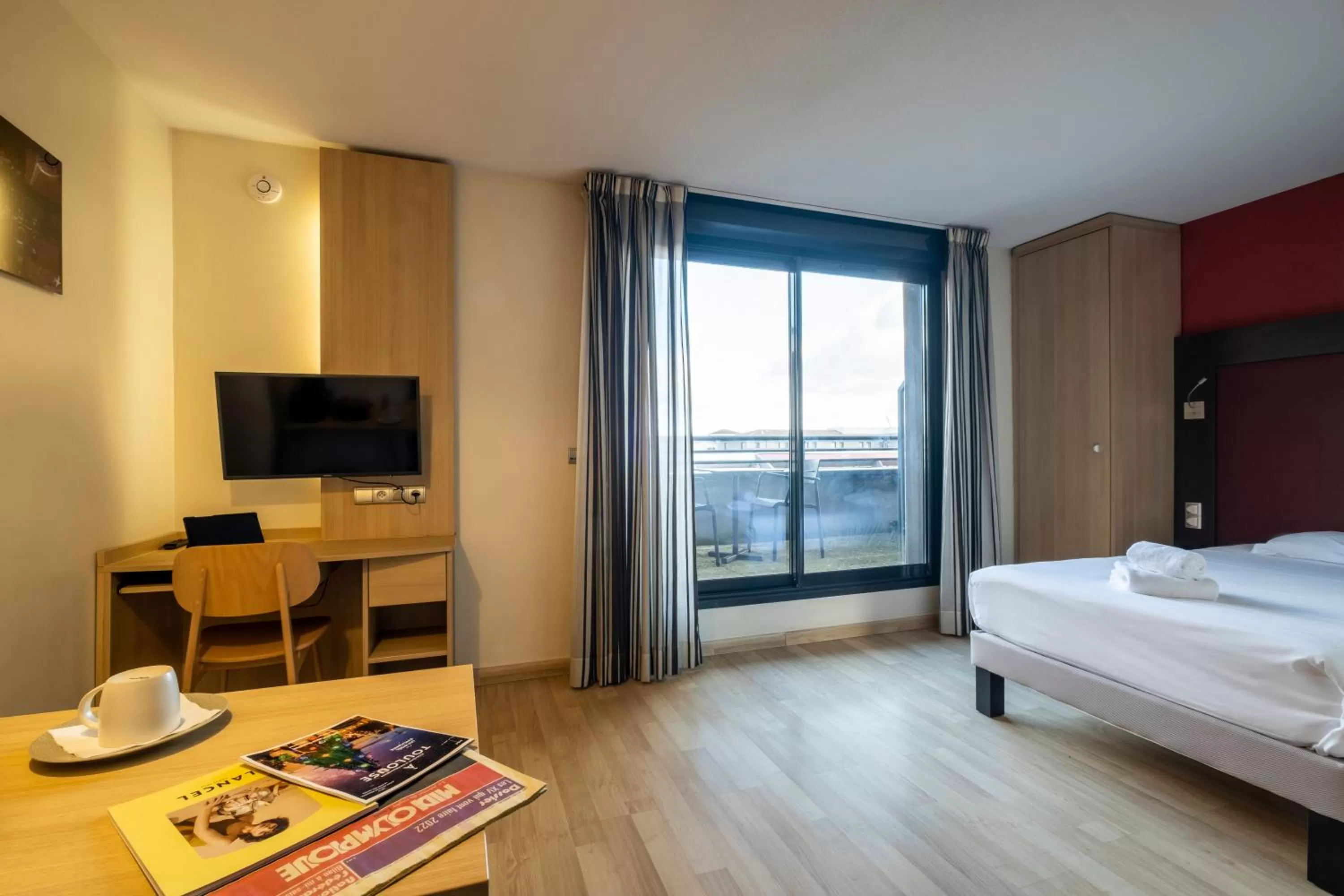Photo of the whole room, Bed in Clarion Aparthotel Toulouse Blagnac Airport