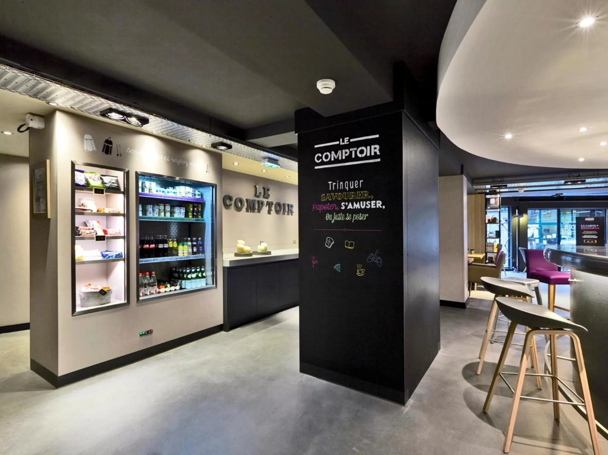 Communal lounge/ TV room in Campanile Nancy Centre - Gare