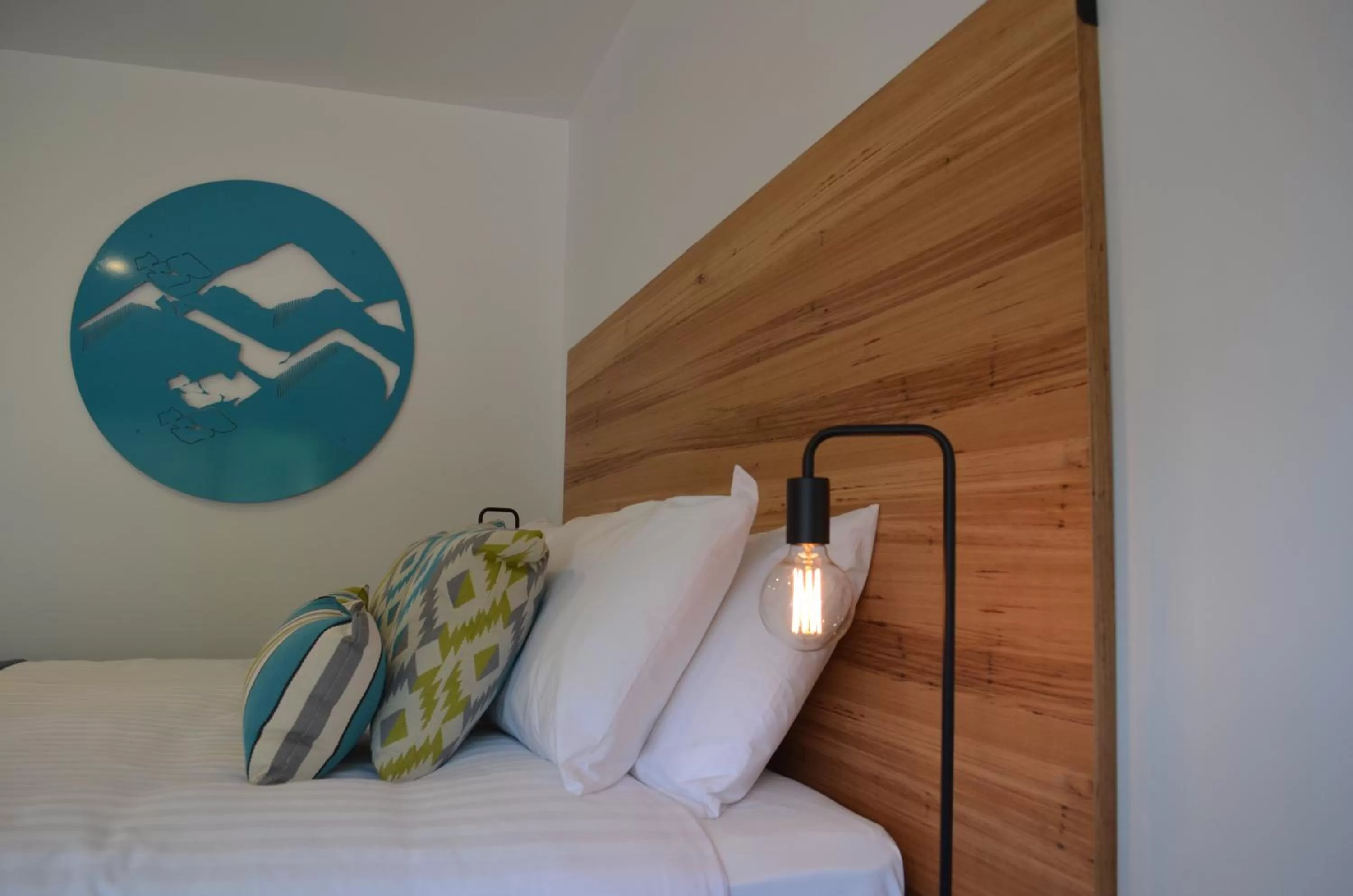 Bed in Bright Colonial Motel