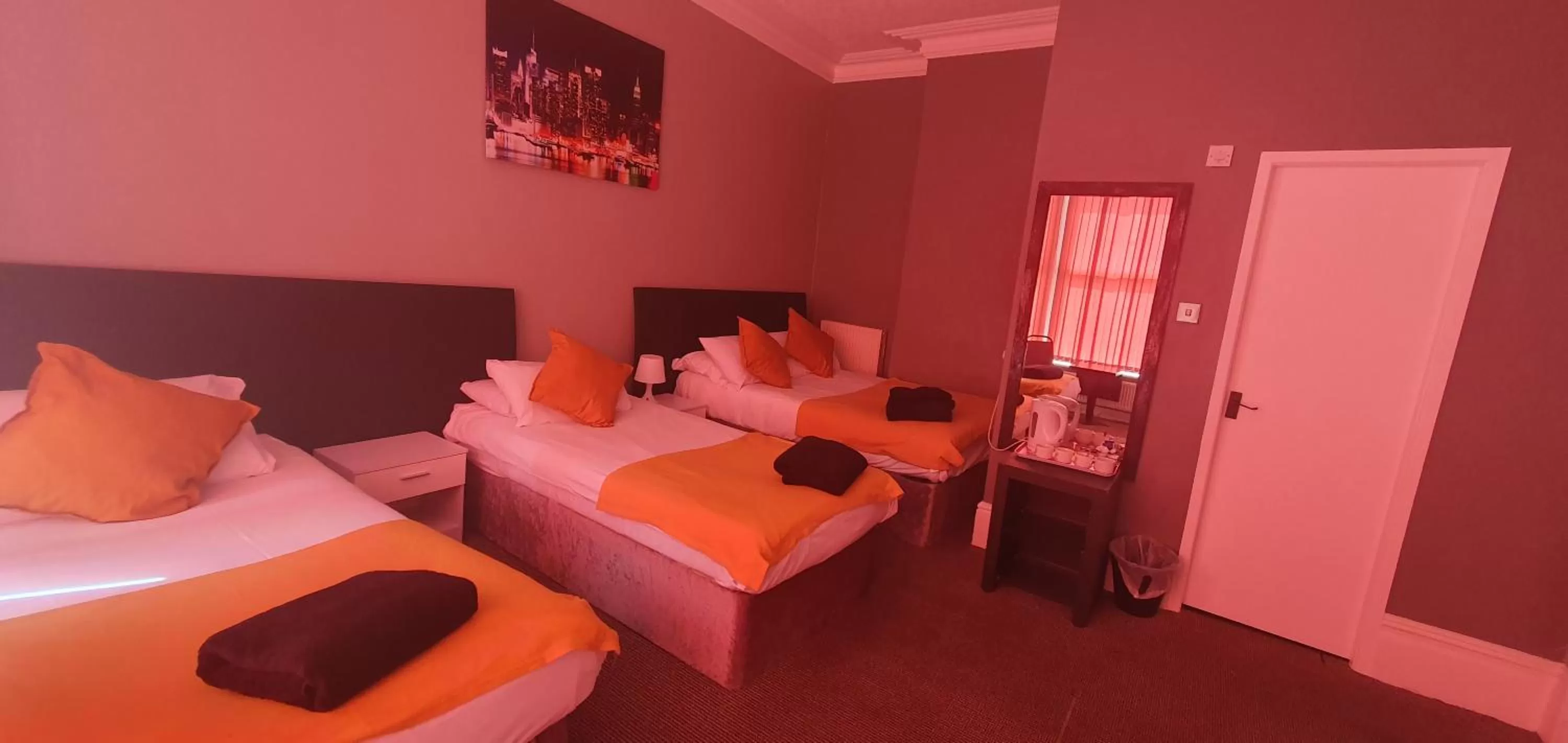 Bed in Palm Beach Hotel by the Sea