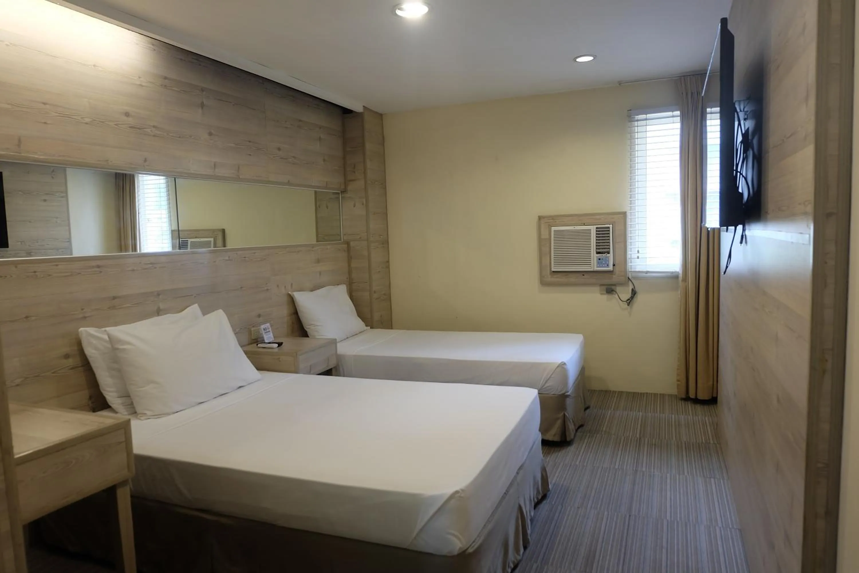 Photo of the whole room, Bed in Spaces Hotel Makati