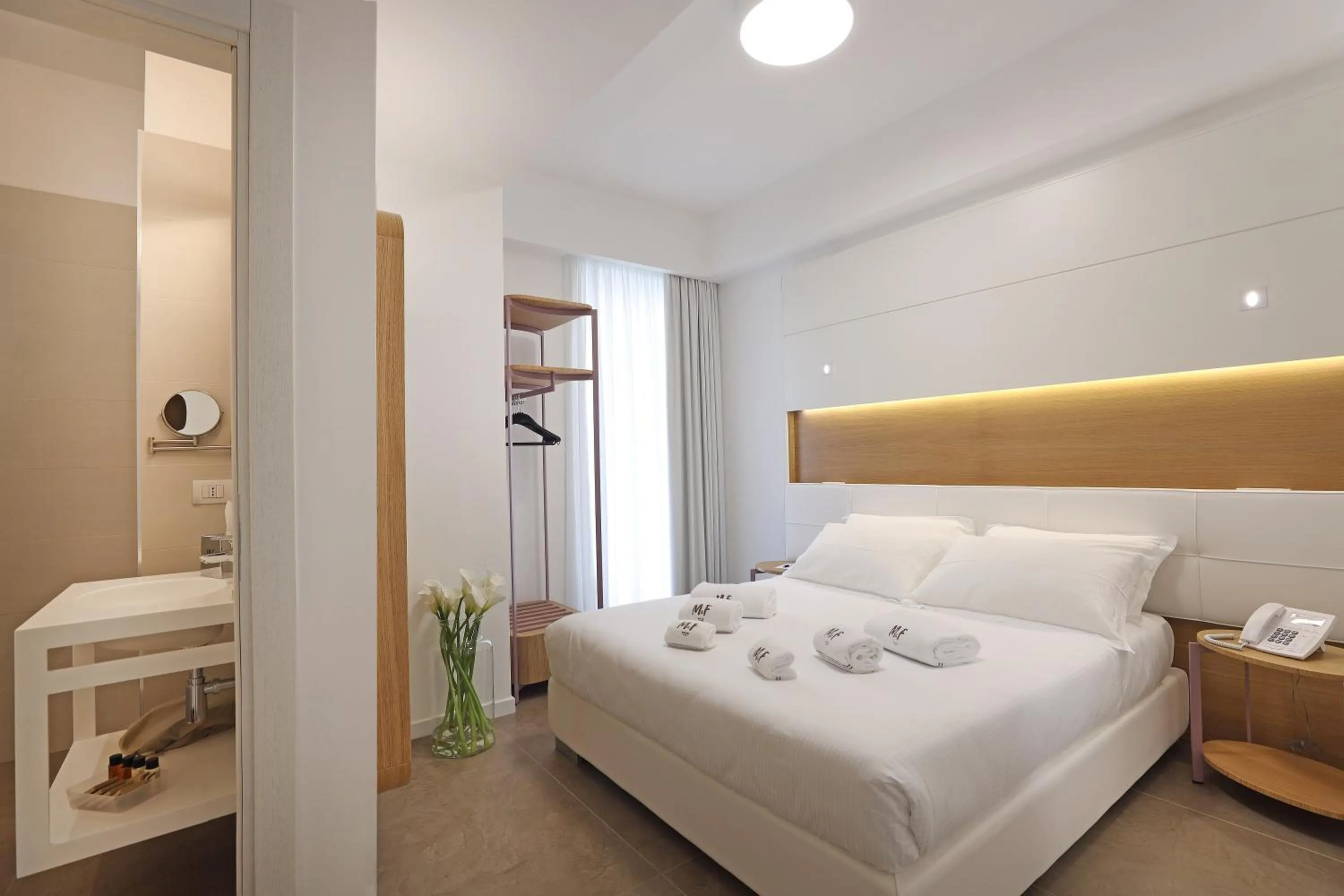 Photo of the whole room, Bed in M&F Hotel