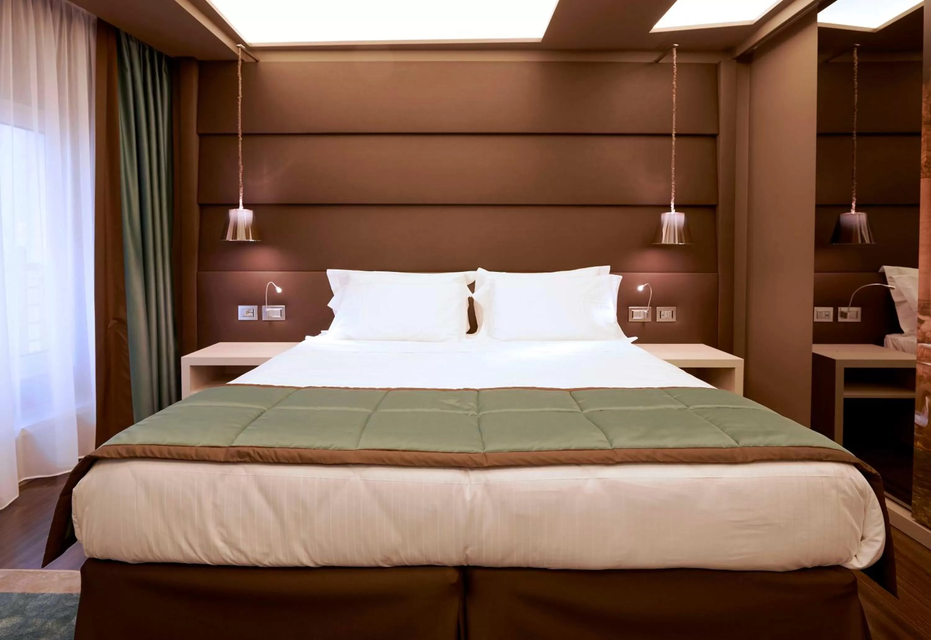 Bed in Harry's Bar Trevi Hotel & Restaurant