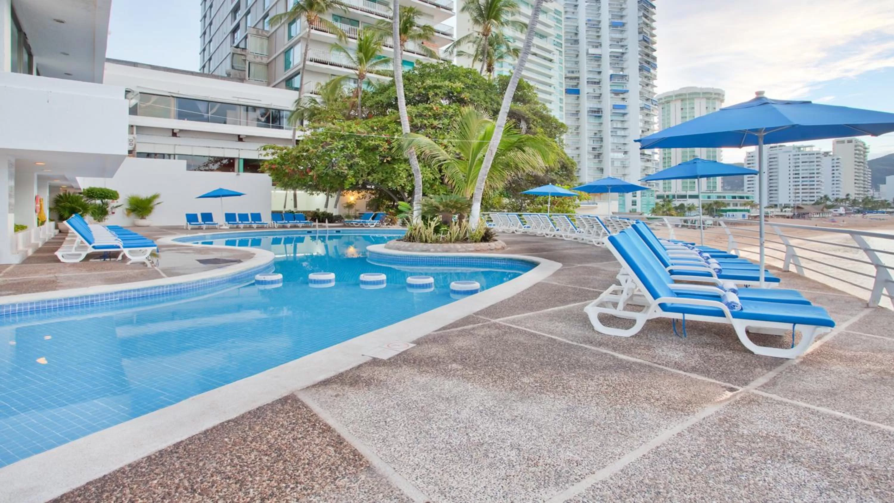 Property building, Swimming Pool in Holiday Inn Resort Acapulco, an IHG Hotel