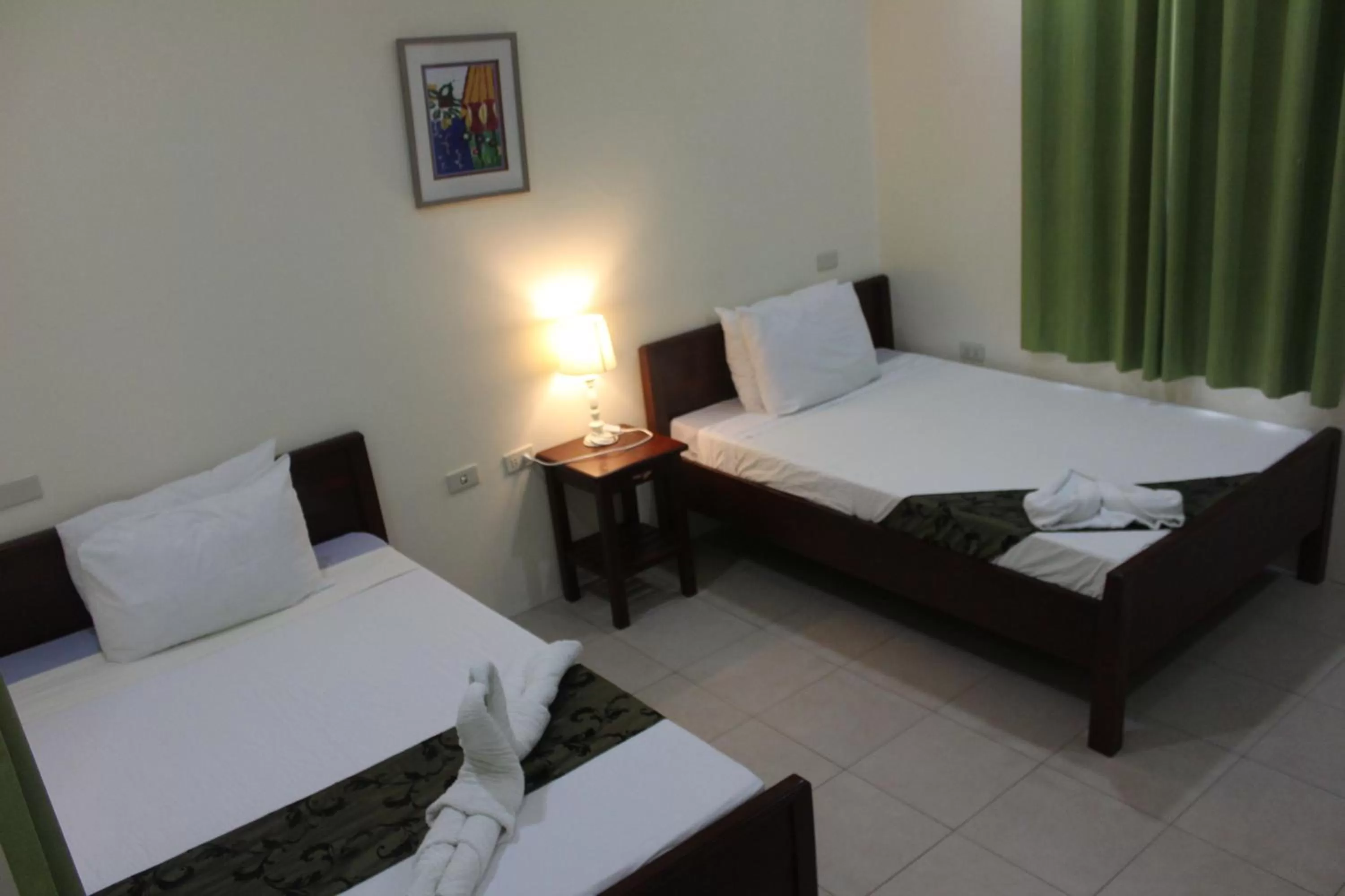 Bedroom, Bed in Blue Lagoon Inn & Suites