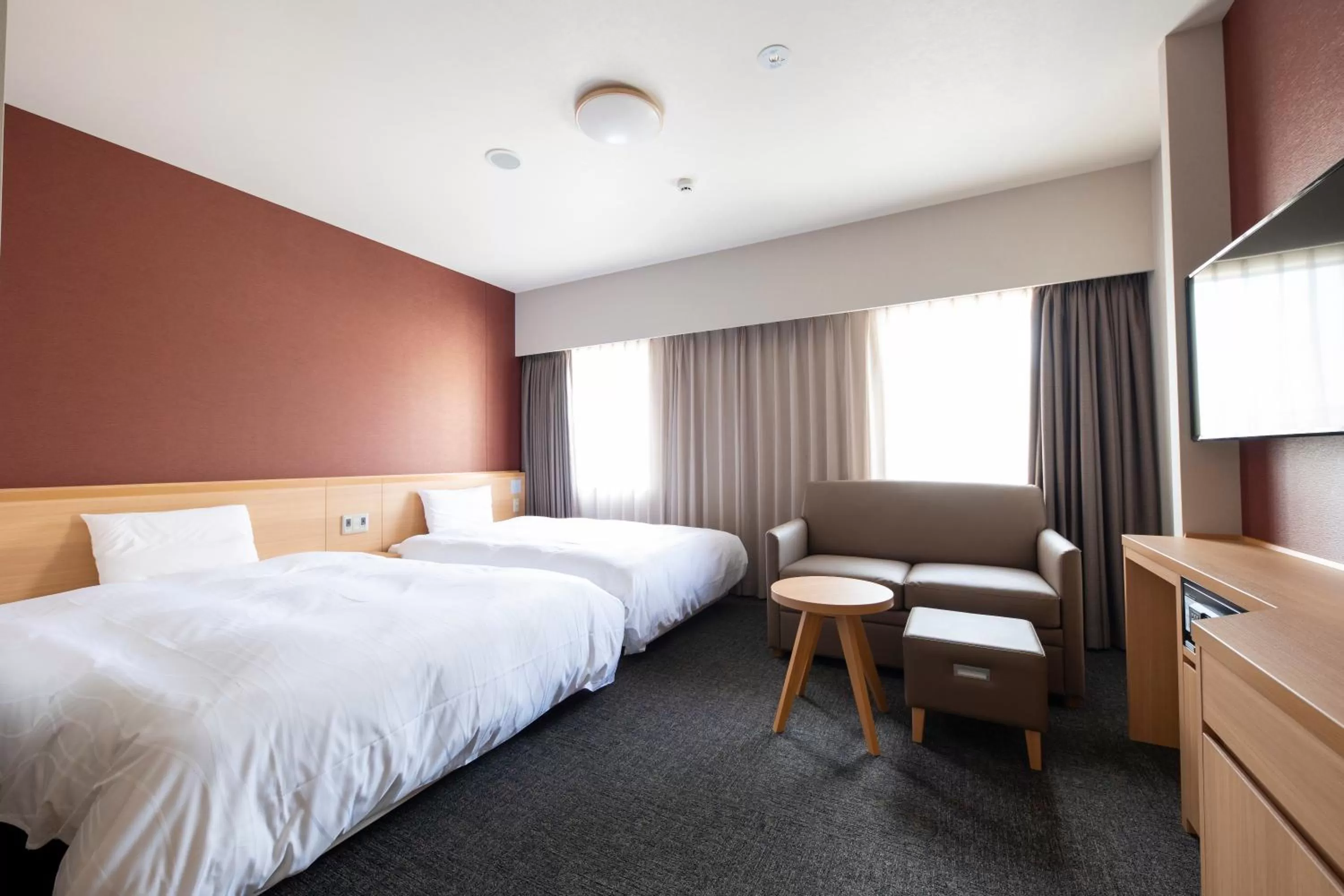 Bed in Dormy Inn Premium Nagasaki Ekimae