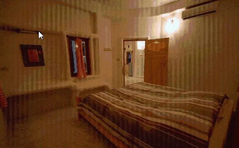 Bed in Scenic Riverside Resort