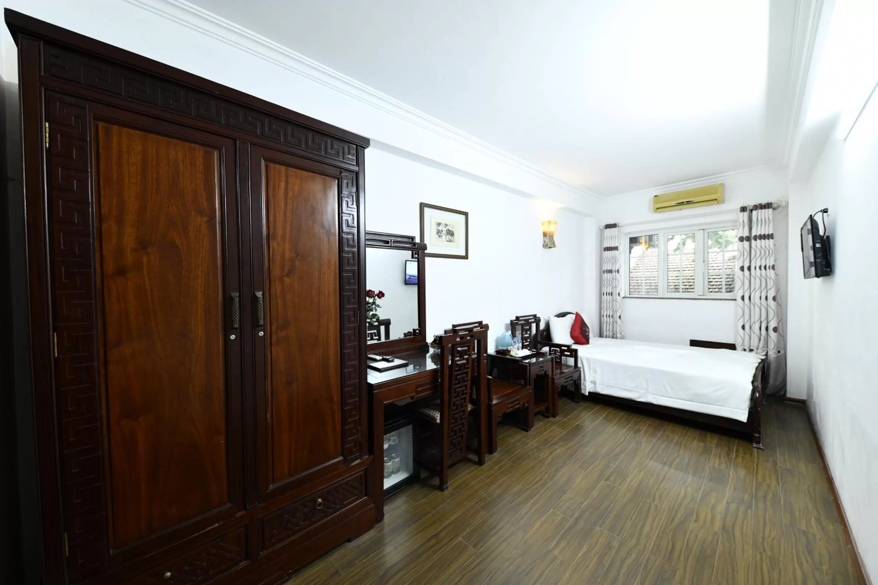 Bed in Phoenix Legend Hotel Hanoi